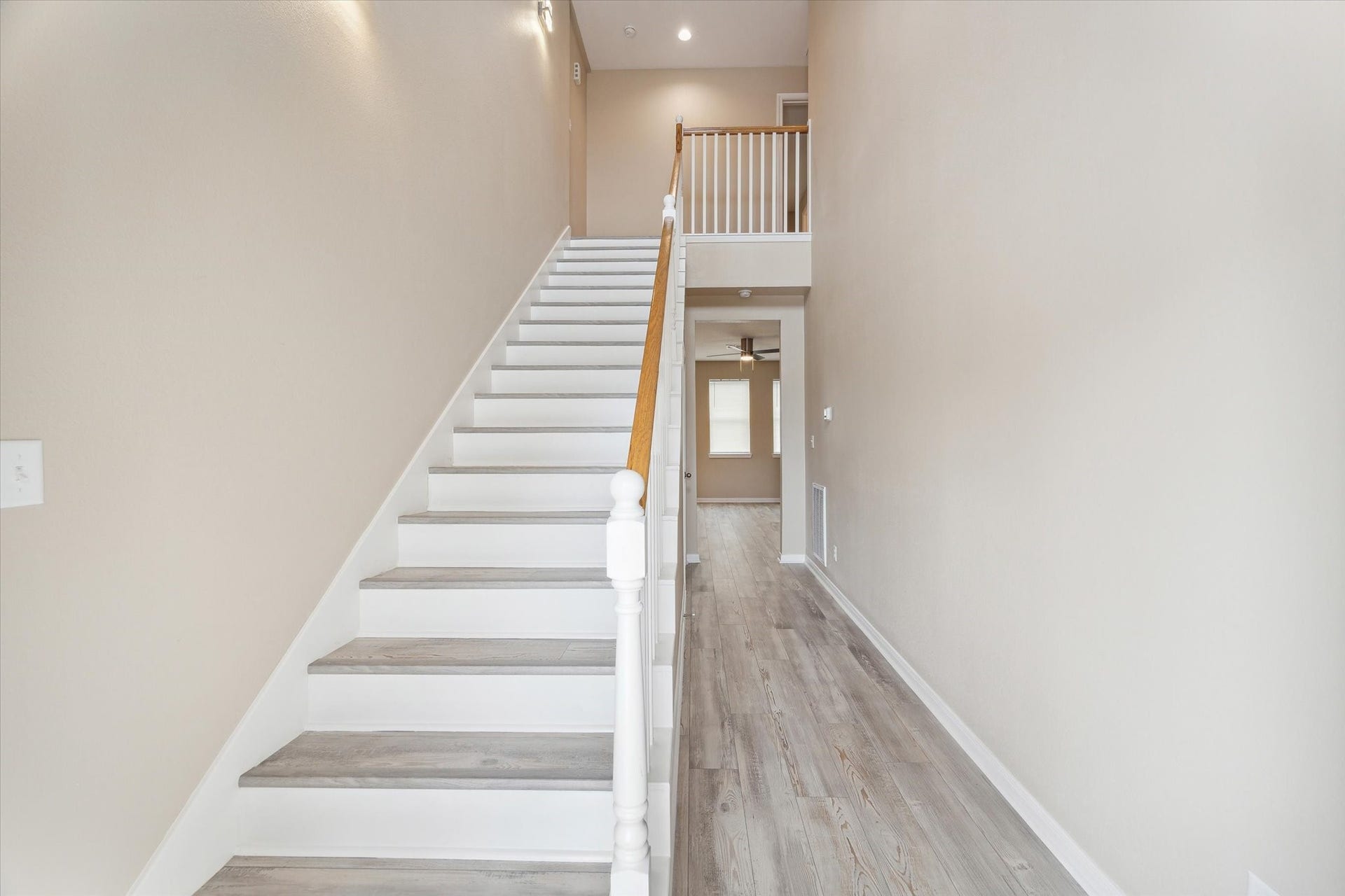 Tall ceiling at entry leading to second floor