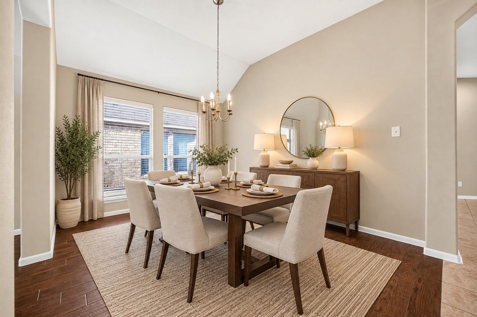 9307 Russeff Field Lane, Rosenberg, TX 77469 Virtually staged formal dining room highlighting the vaulted ceiling, natural light, and spacious layout.