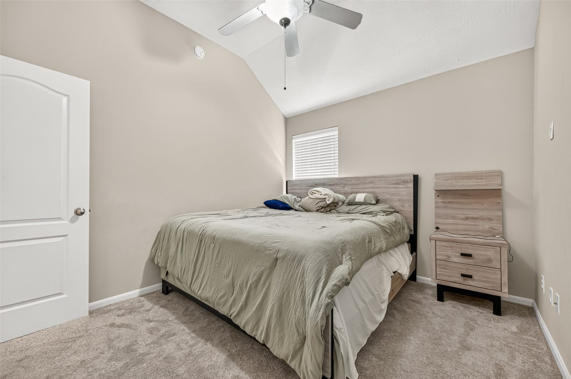 9307 Russeff Field Lane, Rosenberg, TX 77469 Another view of the secondary bedroom highlighting the neutral walls, carpeting, and closet access.