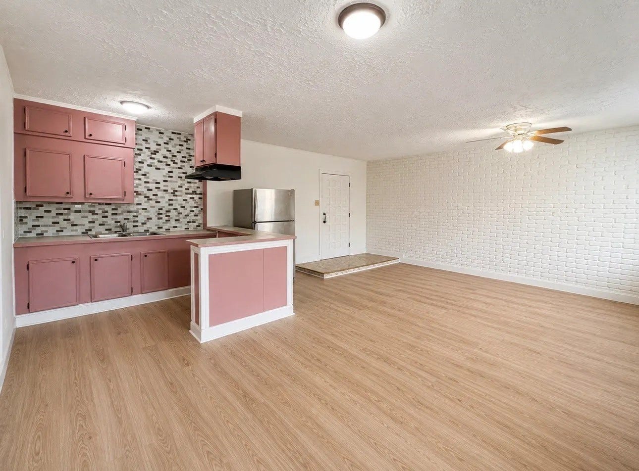 5526 Stonewall Street, #C, Houston, TX 77020 Living dining combo with a bar to pull up to for a snack or to work at.