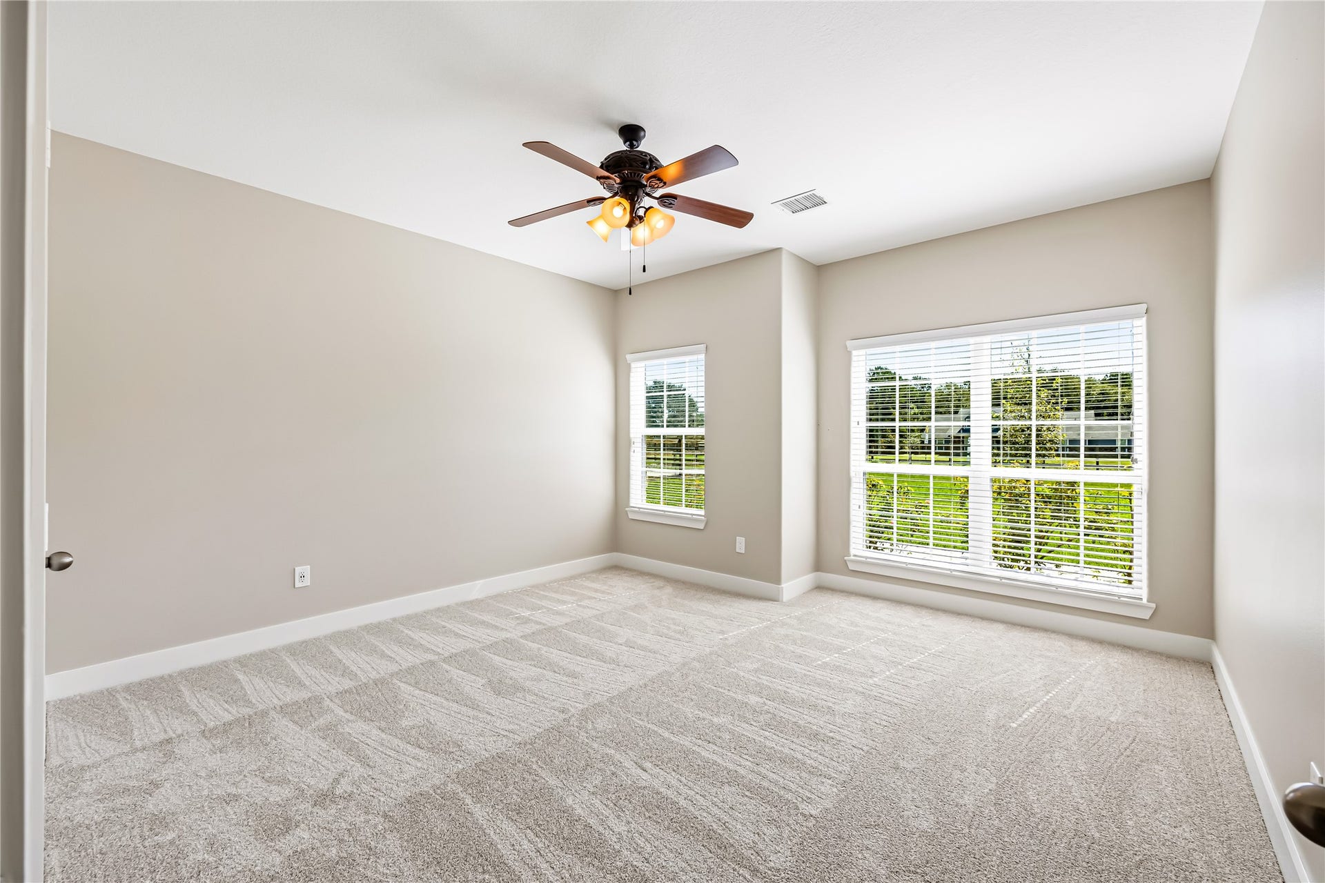 Oversized Bedroom off Kitchen Hallway