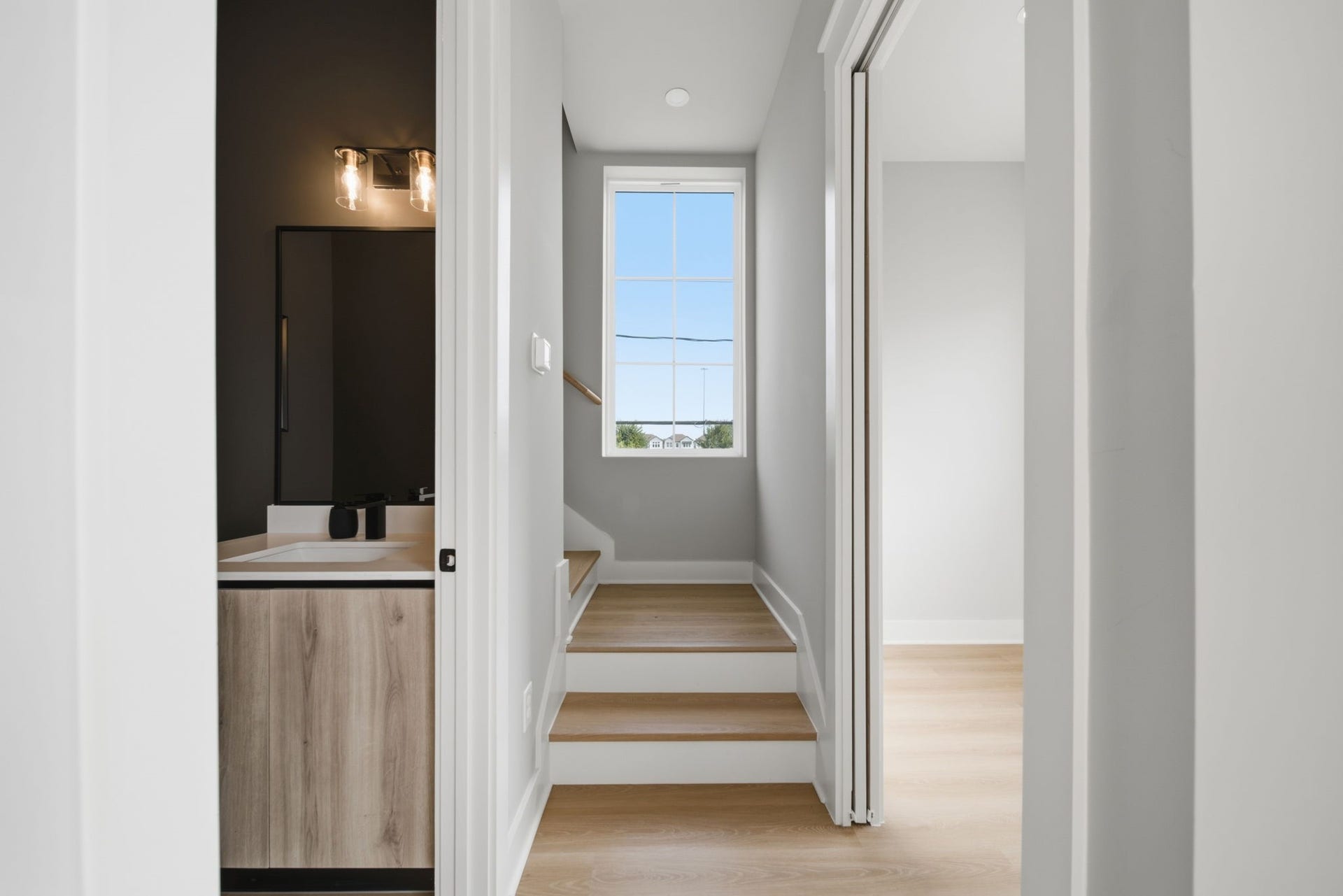 4430 Providence Street, #B, Houston, TX 77020 Stairway view of convenient access to the dedicated study and powder room located on the second floor.