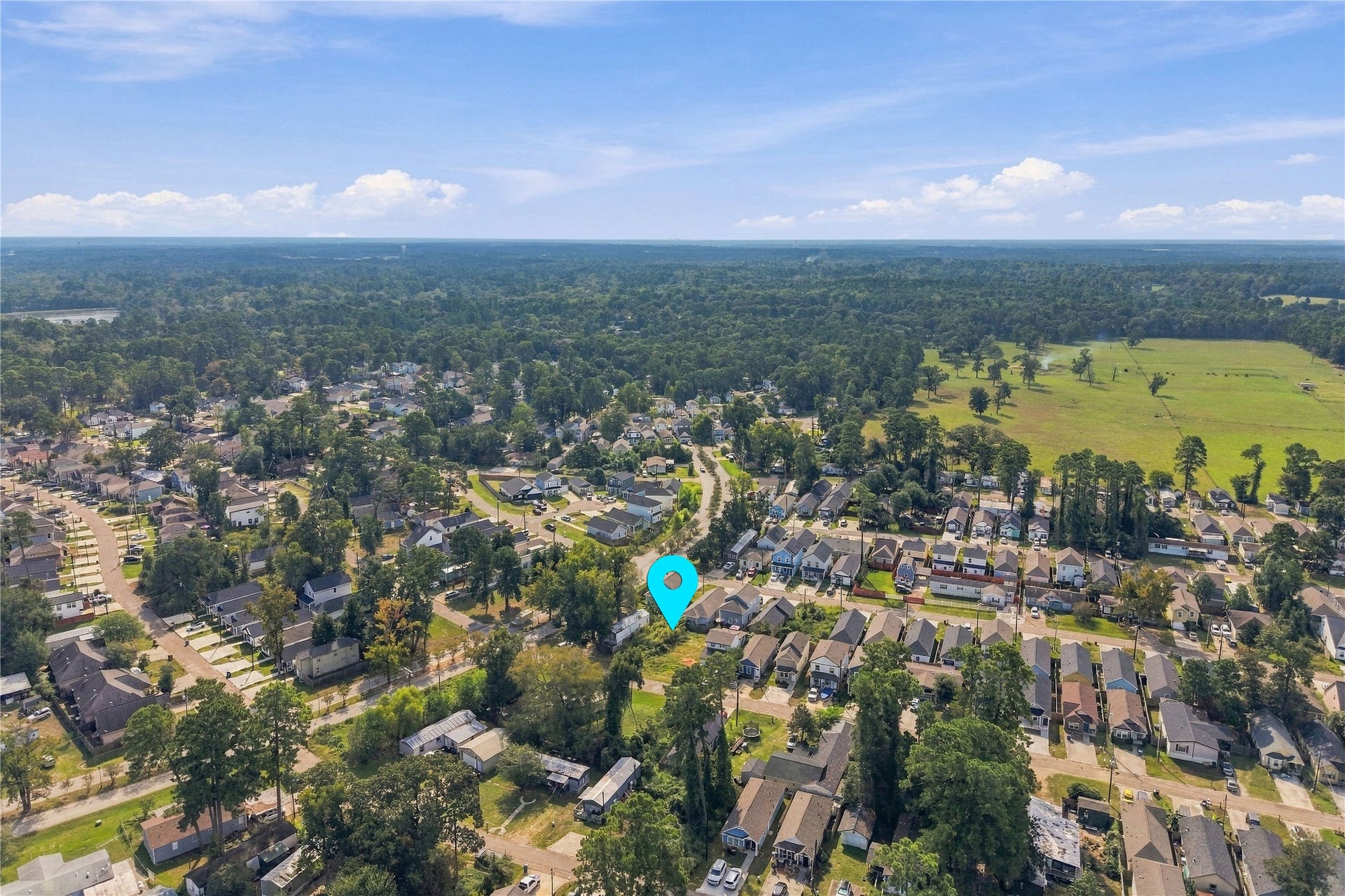 16859 W Ivanhoe, Montgomery, TX 77316 Additional aerial perspective of the property and surrounding area.