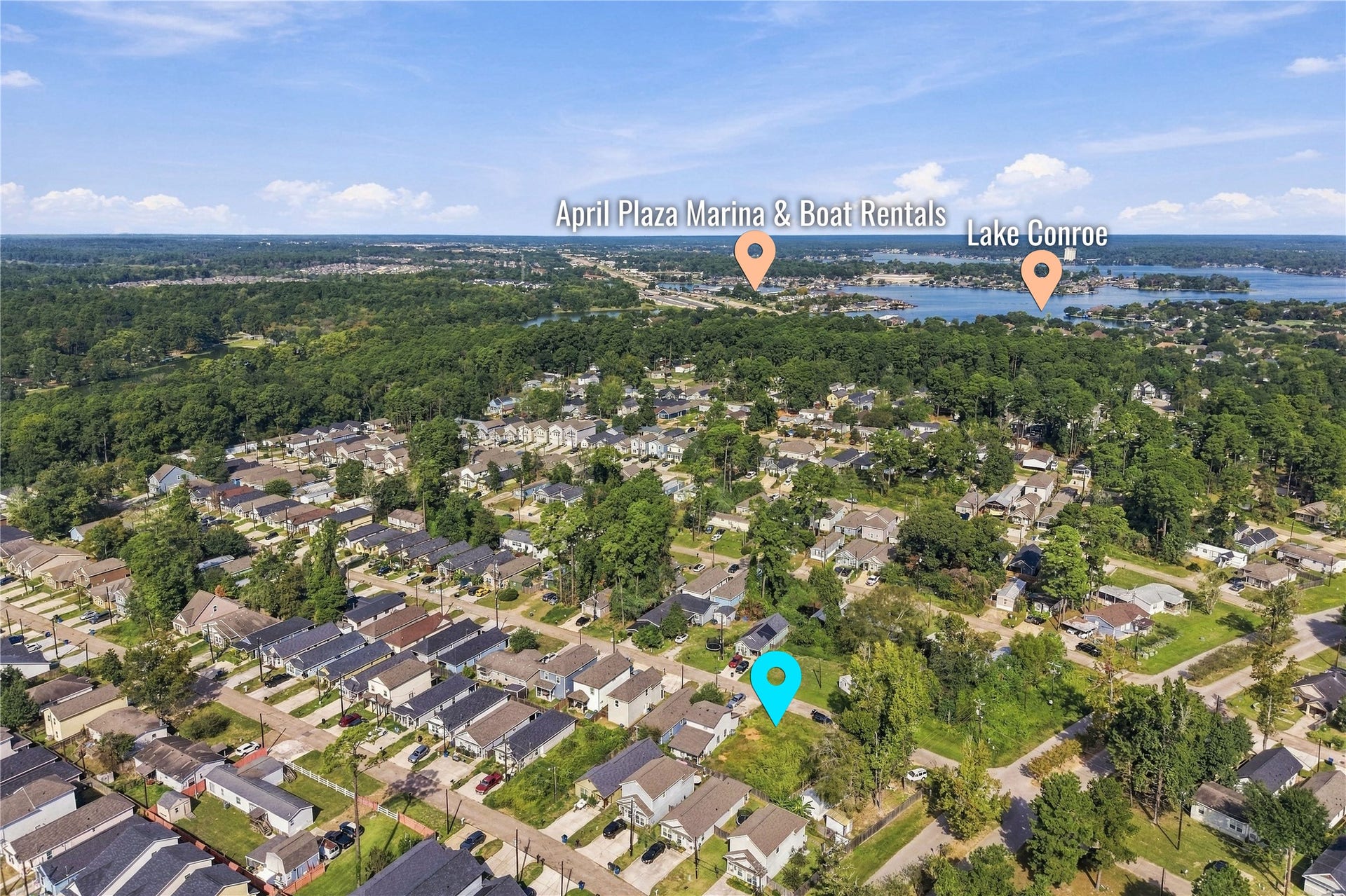 16859 W Ivanhoe, Montgomery, TX 77316 Neighborhood aerial showing nearby residential development.