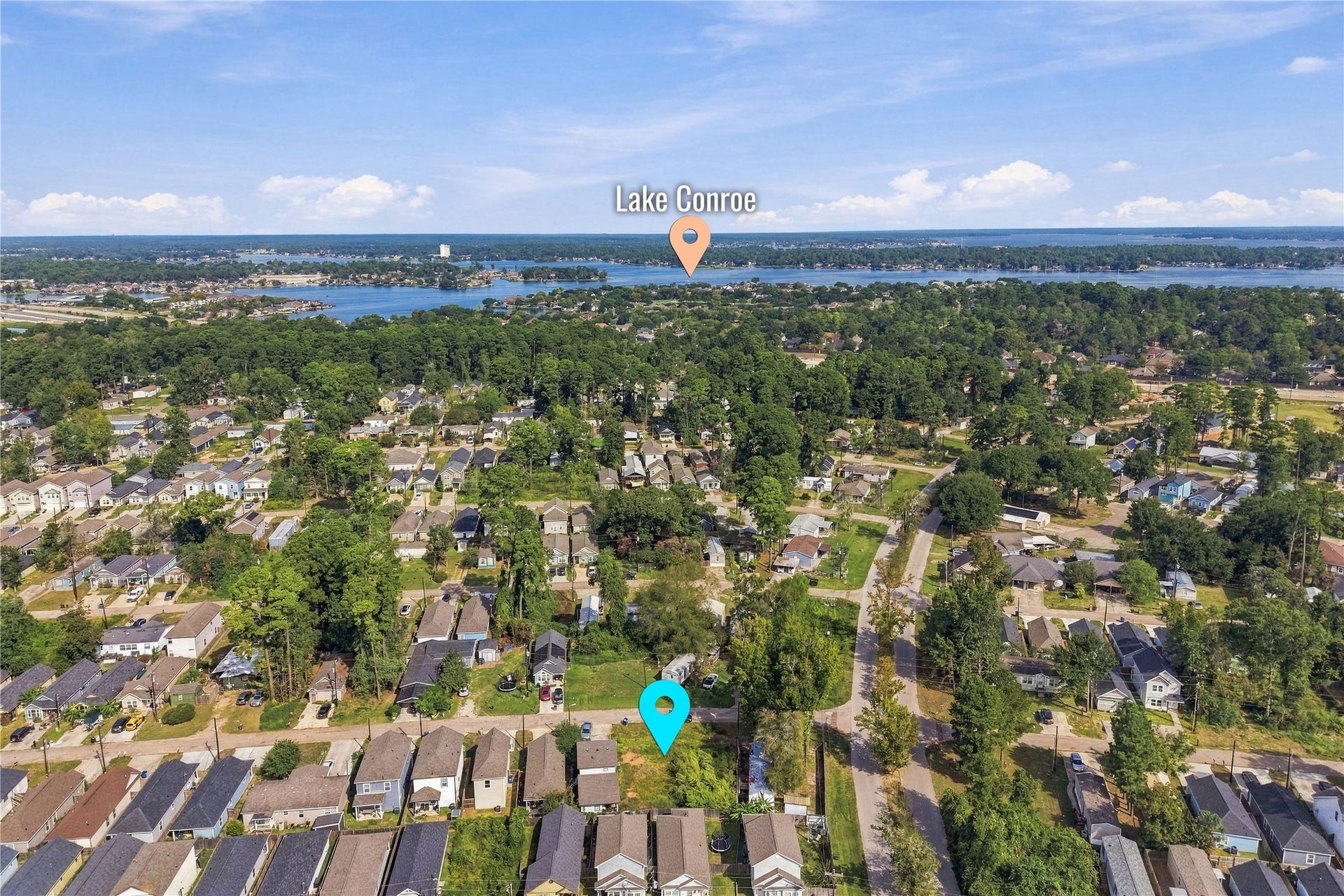 16859 W Ivanhoe, Montgomery, TX 77316 Wide aerial perspective of the Lake Conroe Village area.