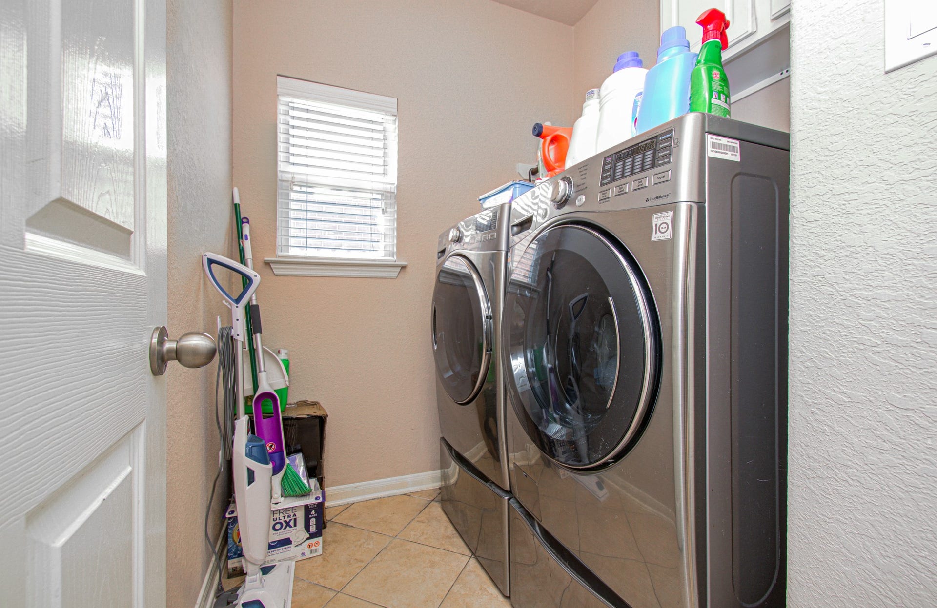 5935 Preserve Lane, Missouri City, TX 77459 Enjoy the convenience of a dedicated first-floor laundry room that makes everyday chores easier to manage. With a designated space for washing, drying, and organizing laundry, this practical feature adds everyday convenience and functionality to the home.