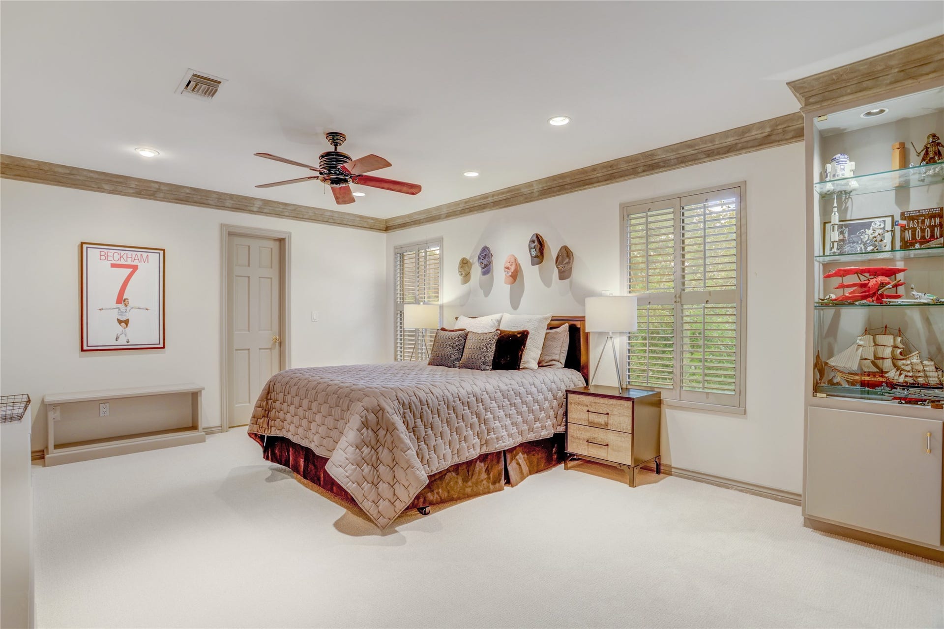 Another secondary bedroom with terrific built ins and a large walk in closet