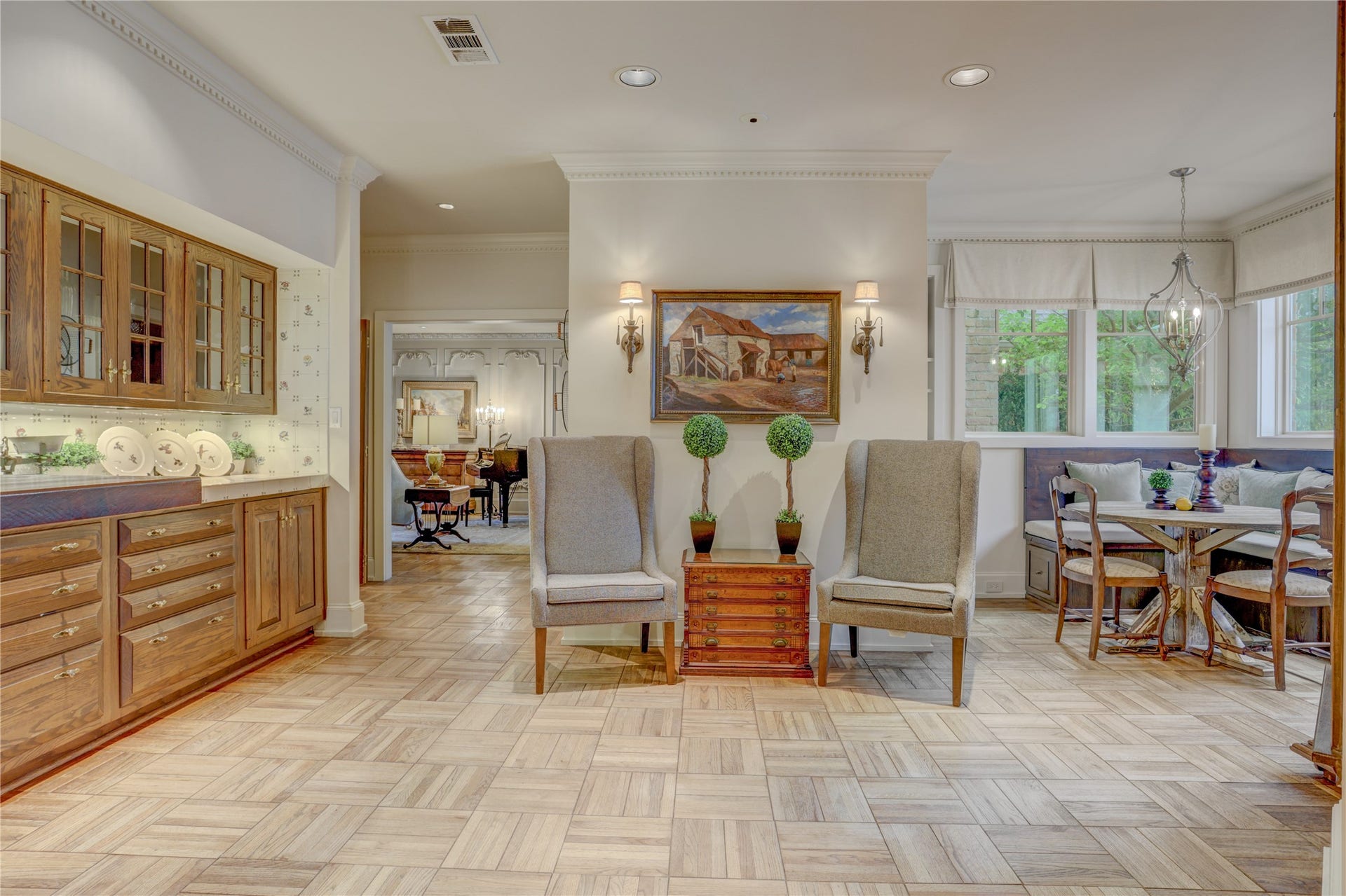 The breakfast room with terrific built ins and a seating area with  custom seating with additional storage
