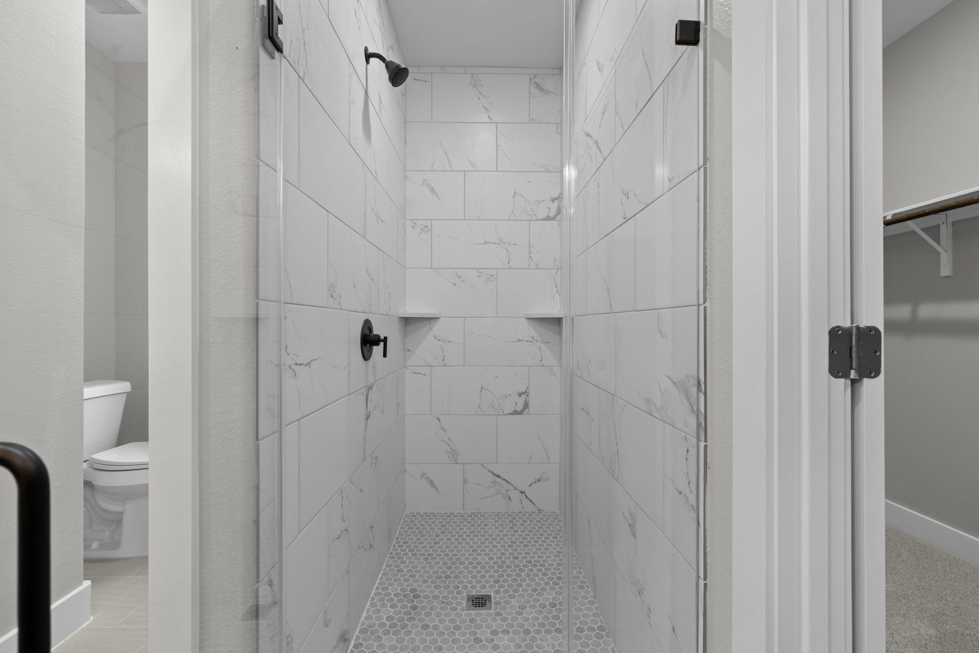 529 Mohawk Bend, Conroe, TX 77316 Primary Bath Shower with floor to ceiling tile and frameless door