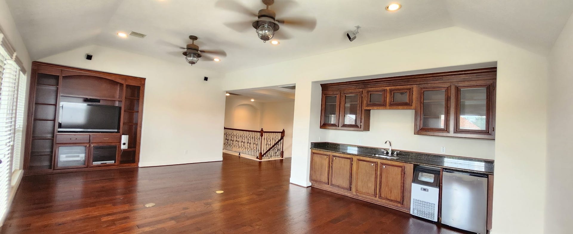 14330 Dunrobin Way, Sugar Land, TX 77498 Along one side of the game room: sink, mini fridge, and many possibilities
