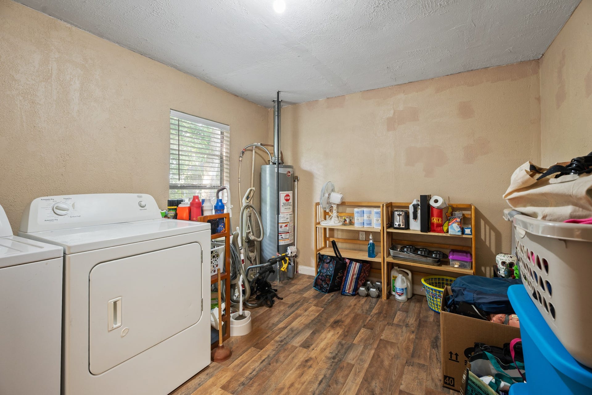 4514 E 24th E Street, Dickinson, TX 77539 Oversized utility room in the house...