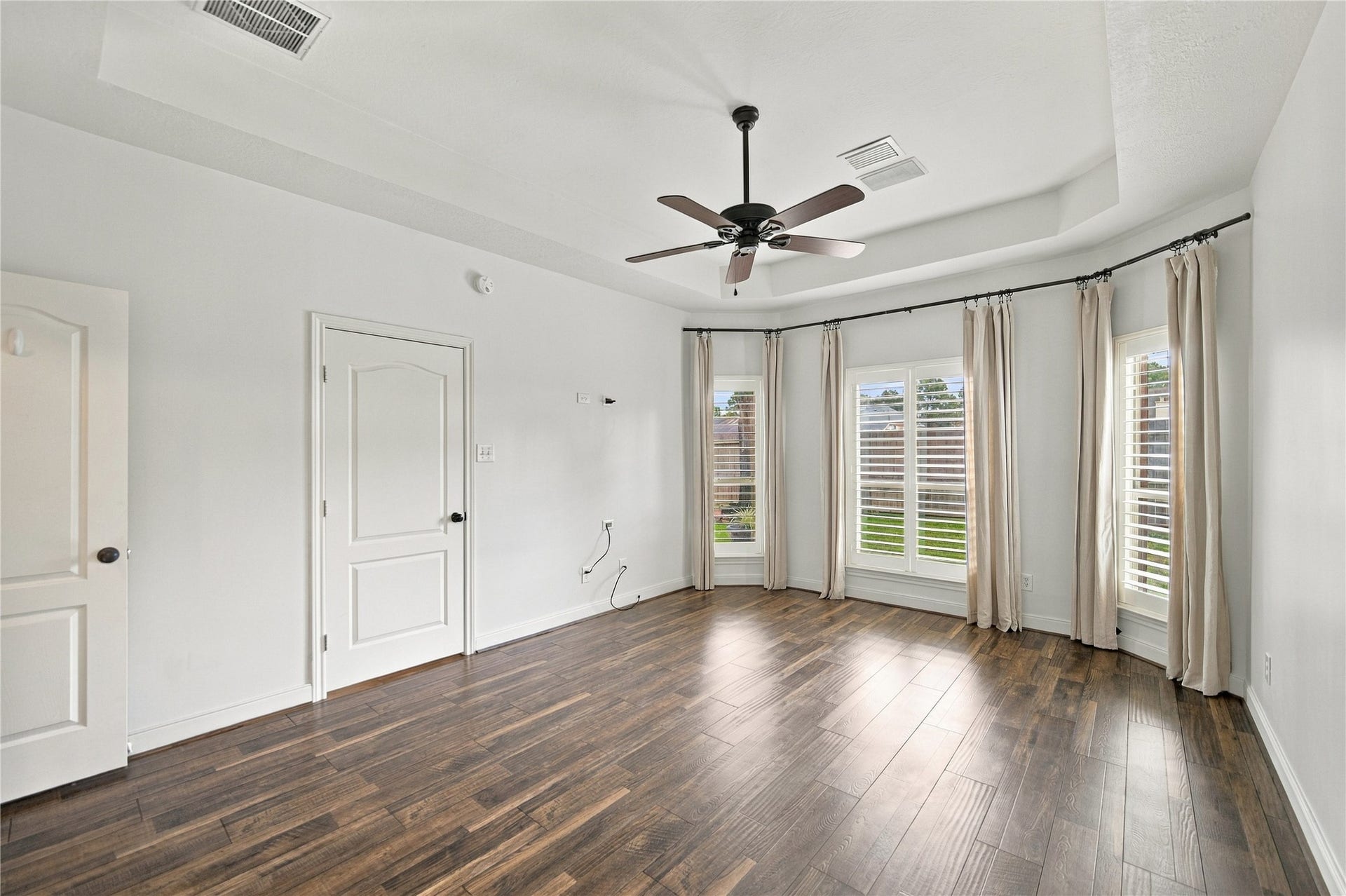23706 Indian Hills Way, Katy, TX 77494 This spacious primary bedroom is further complemented by gleaming floors and a ceiling fan. There's plenty of room for any-size bed and whatever furniture you like!