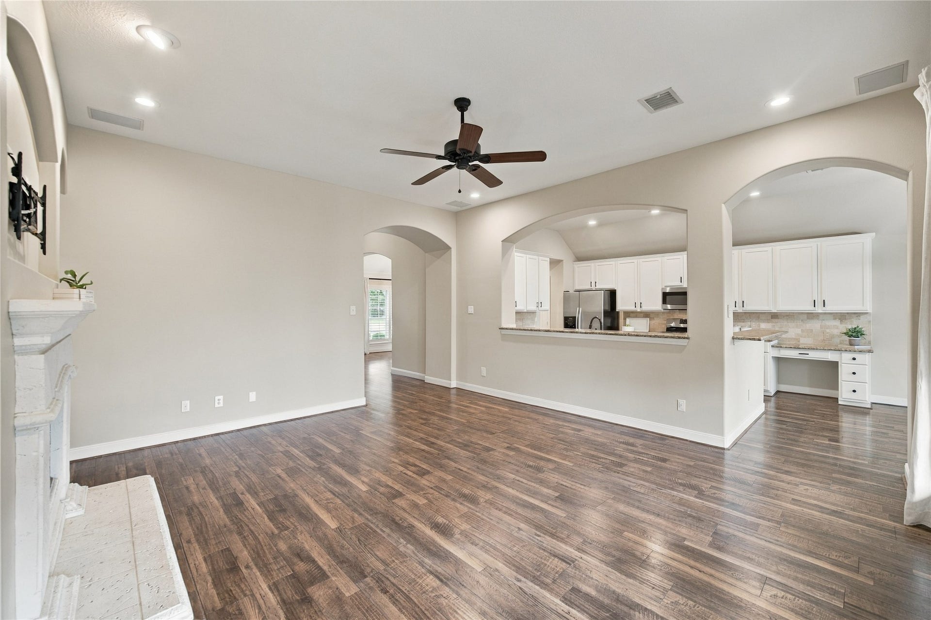 23706 Indian Hills Way, Katy, TX 77494 A sweeping view of the family room showcases the home's comfortable layout. Freshly painted throughout and featuring neutral finishes, this inviting home is move-in ready!