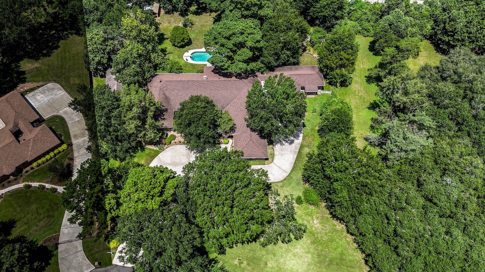 18926 Wildrose Lane, Tomball, TX 77377 Beautiful tree's shade this wonderful acreage property!