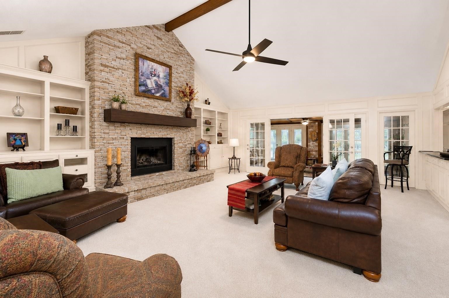 18926 Wildrose Lane, Tomball, TX 77377 Digitally enhanced - showing a different look where the ONLY CHANGES ARE: painting the walls and cabinetry, adding stacked stone on the fireplace, floating mantel and new ceiling fan!