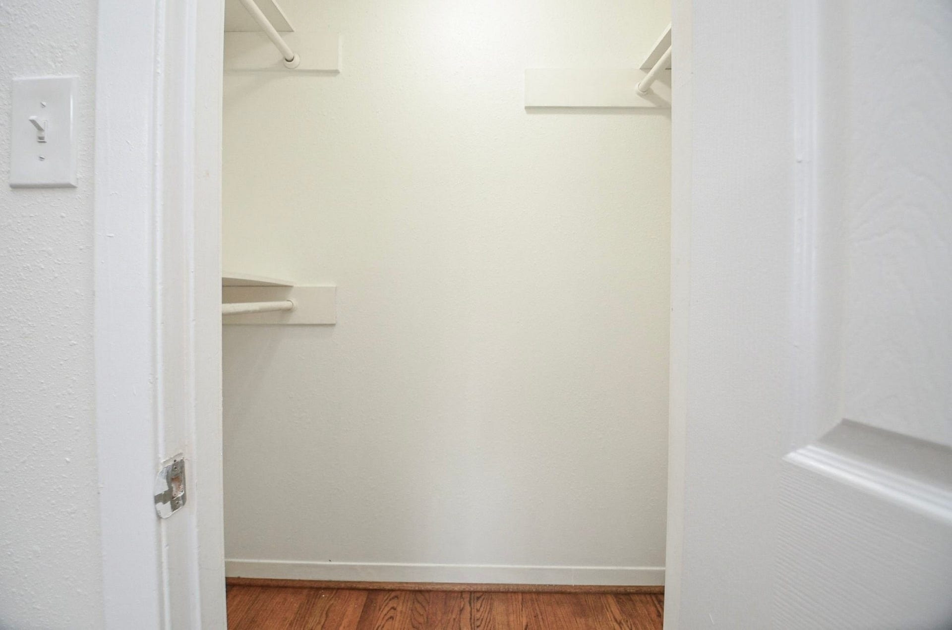 5515 Saxon Drive, Houston, TX 77092 Walk-in closet with built-in shelving on multiple sides.