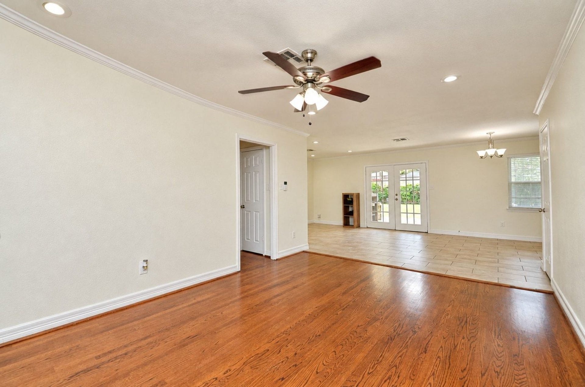 5515 Saxon Drive, Houston, TX 77092 Fresh paint and recessed lighting highlight the neutral tile and wood floors!