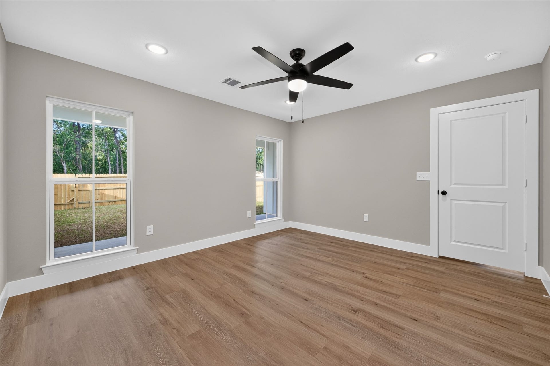1060 Mann Road, #B, Conroe, TX 77303 Master bedroom is located the farthest from the living room/kitchen area.