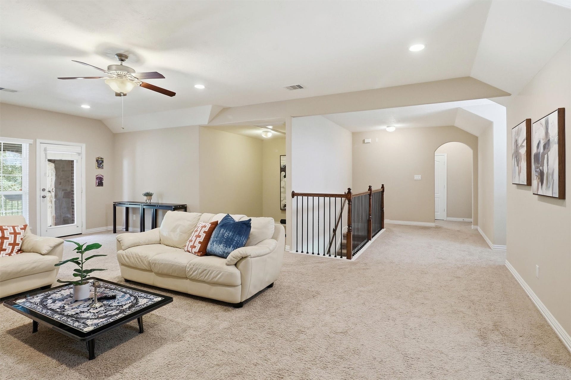 3219 Cotton Ranch Drive, Katy, TX 77494 The upstairs landing provides easy access to all secondary bedrooms while maintaining an open, airy feel throughout the second level.
