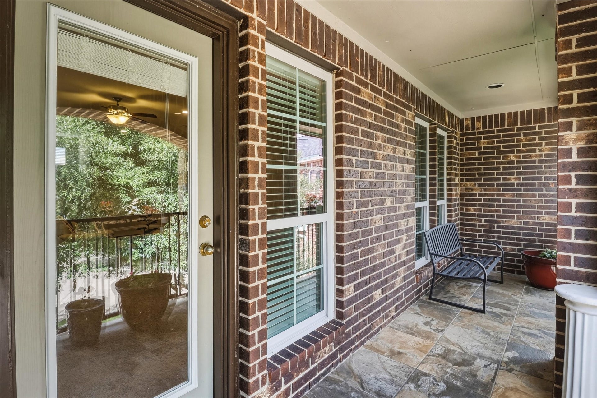3219 Cotton Ranch Drive, Katy, TX 77494 A rare and inviting feature, the covered second-story balcony extends the upstairs living space outdoors.