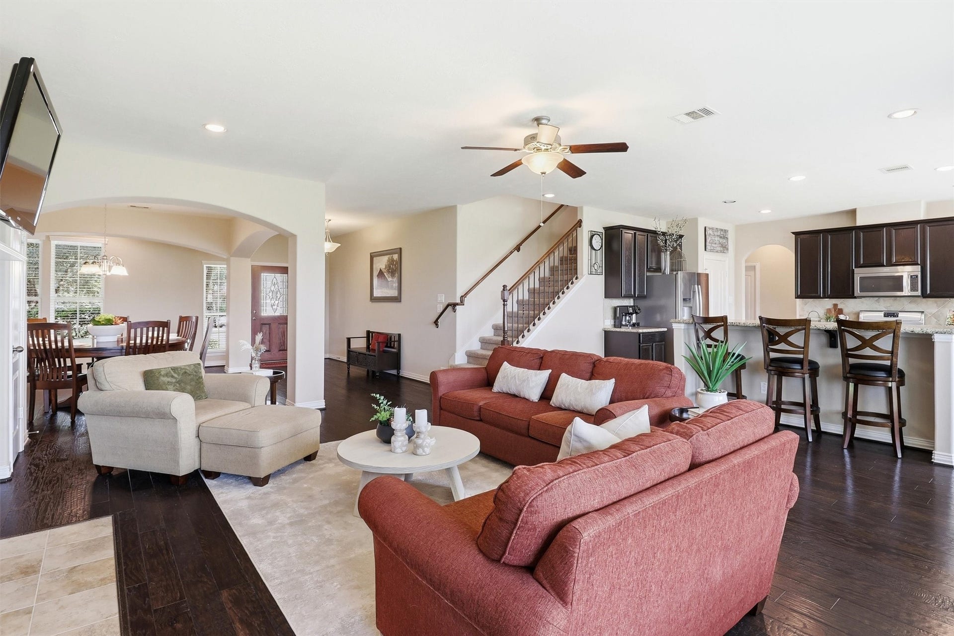 3219 Cotton Ranch Drive, Katy, TX 77494 Designed to be the heart of the home, the expansive family room offers a warm and welcoming atmosphere for both everyday living and memorable gatherings.