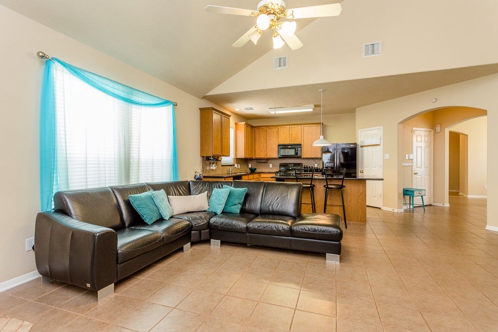 4530 Hall Croft Chase Lane, Katy, TX 77449 Open-concept living area with vaulted ceilings, perfect for entertaining.