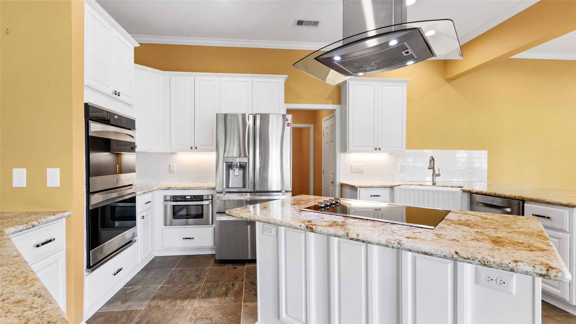 97 Avenue J, Dickinson, TX 77539 This island kitchen is perfect for the chef in your familly