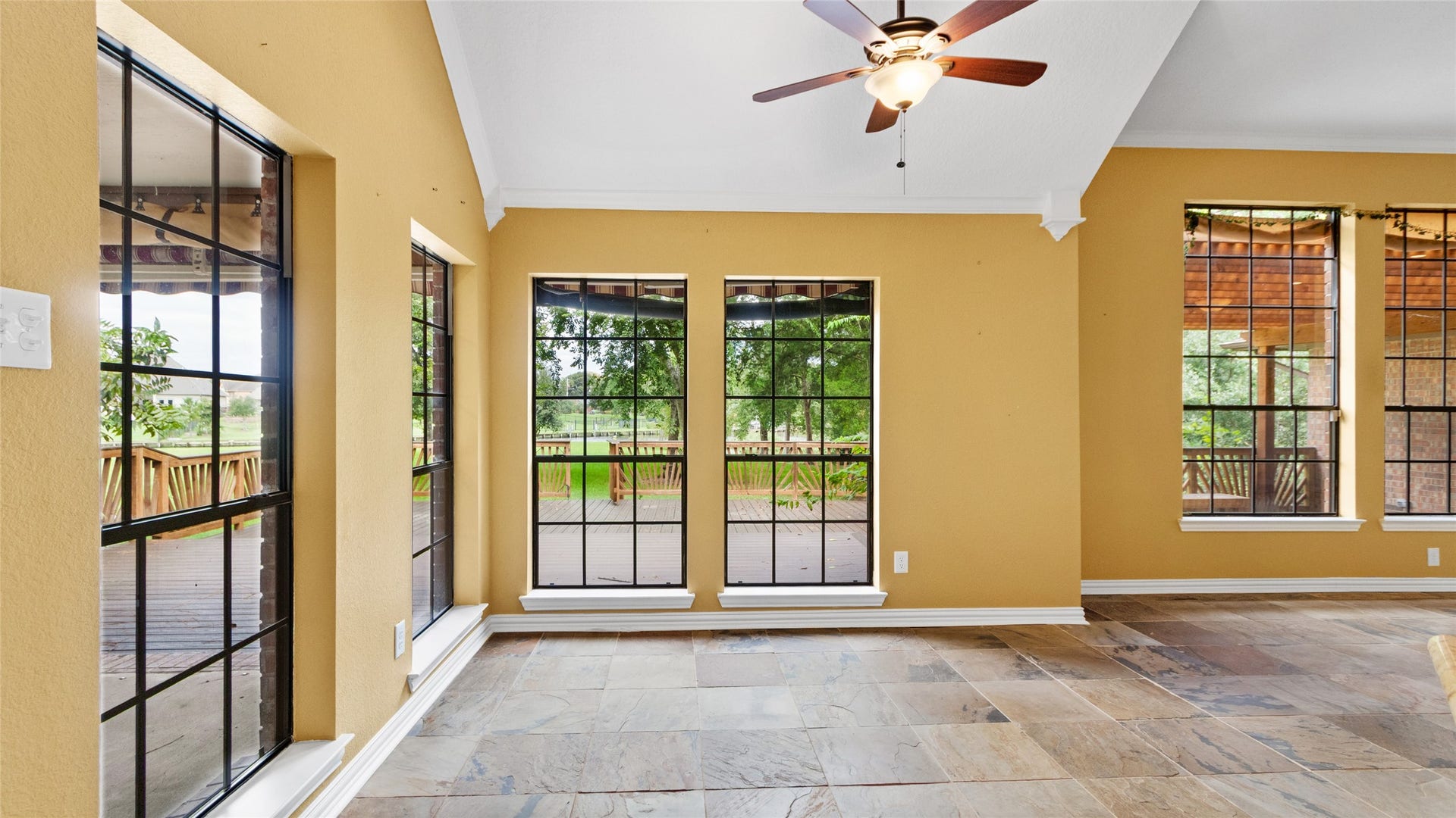 97 Avenue J, Dickinson, TX 77539 Dining area is located off the kitchen and open to the living room with gorgeous views!