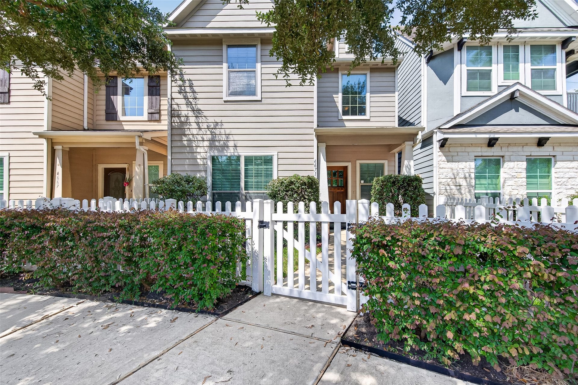 This white picket fence leads to your new home!
