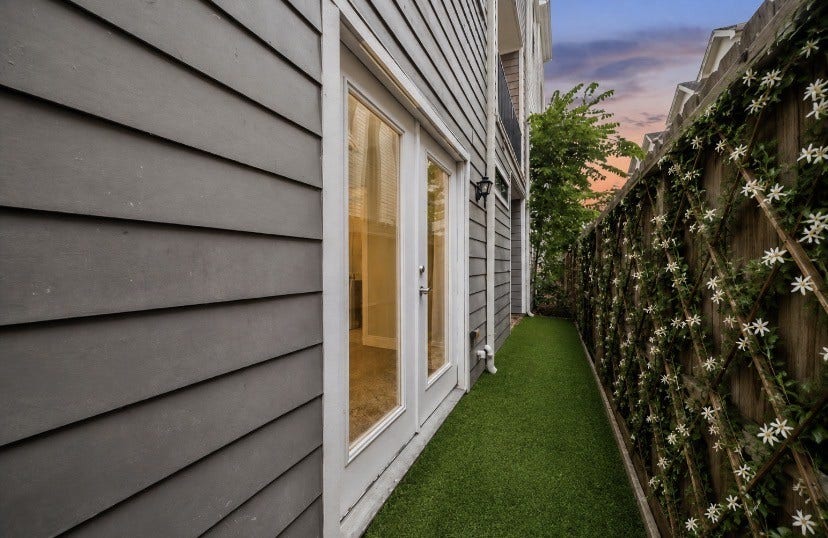 608 W 28th Street, #B, Houston, TX 77008 Virtually staged to show what you might do in a brief weekend project to lay artificial turf grass and install hearty Jasmine on your private back fence! What a great way to improve you outdoor space for the pets &/or the kiddos! LOVELY!