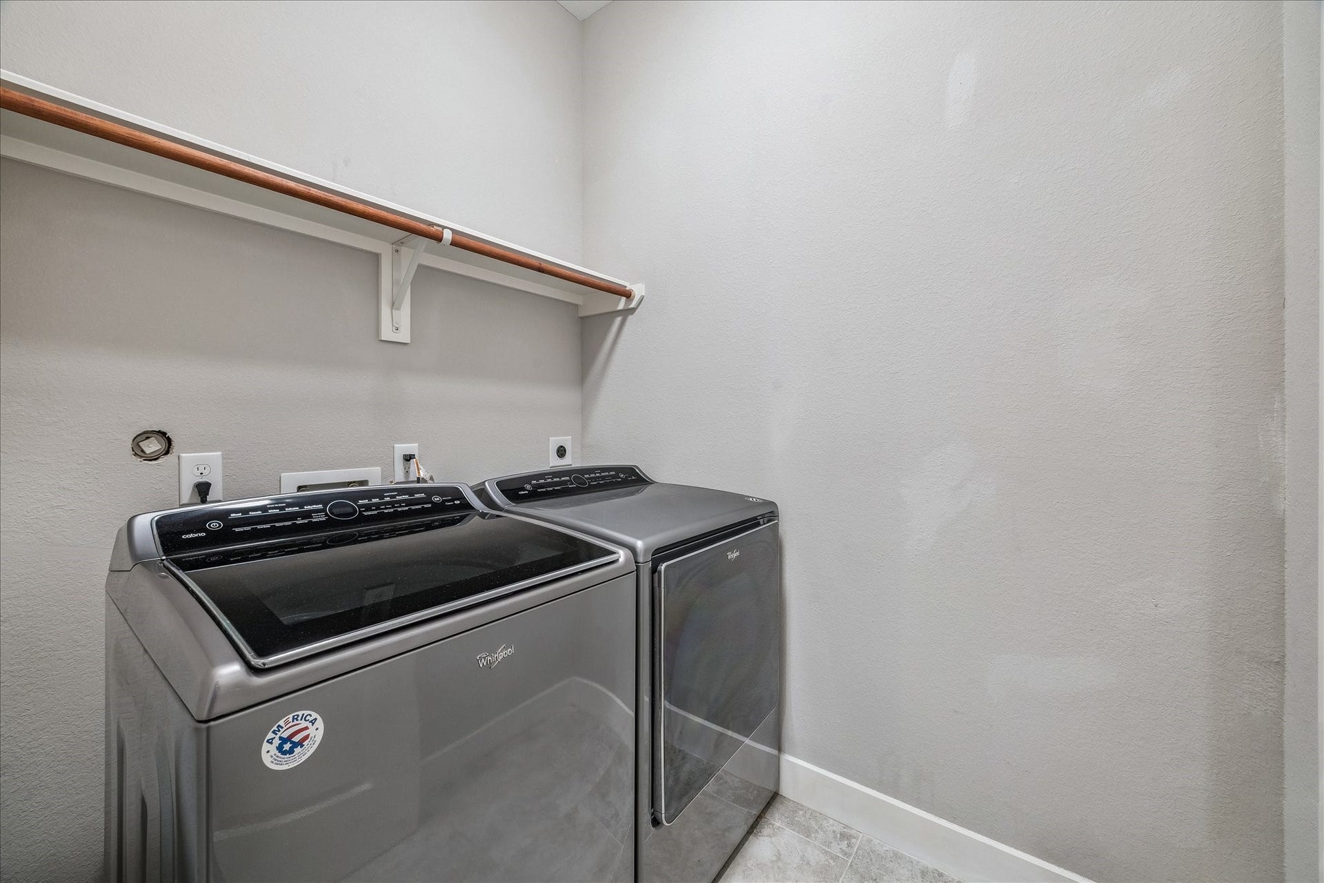 608 W 28th Street, #B, Houston, TX 77008 Wow! A true full size Laundry Room (not laundry closet or nook) with hanging rack and shelving, ceramic tile flooring, emergency overflow drain, LED lighting & more! YES, these are "new-ish" OVERSIZED Wasaher & Dryer that stay with the Home! You may even decide to customize it further with more storage cabinets, lockers or what ever you desire! WONDERFUL!