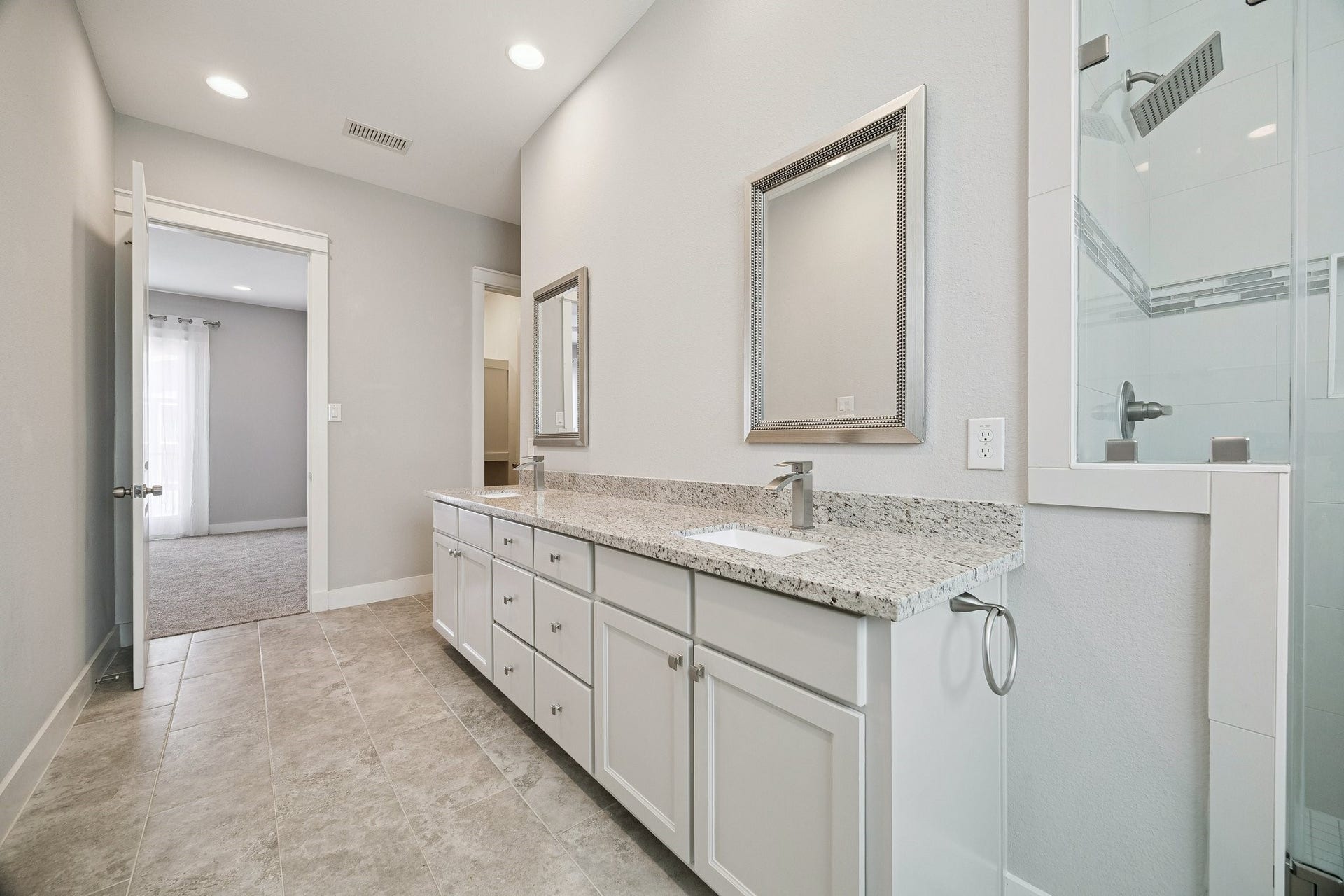 608 W 28th Street, #B, Houston, TX 77008 FINALLY! Now this is how a PRIMARY BATH should feel! NEWLY Renovated (10/2026) - the sprawling dual sink marble vanity boasts to rectangular under mounted porcelain sinks, endless counter space and cabinets and drawers! Private Toilet Closet, 2 HUGE walk-in closets, large soaking tub & oversized step-in shower! Welcome to your new lavish bath retreat! NICE!