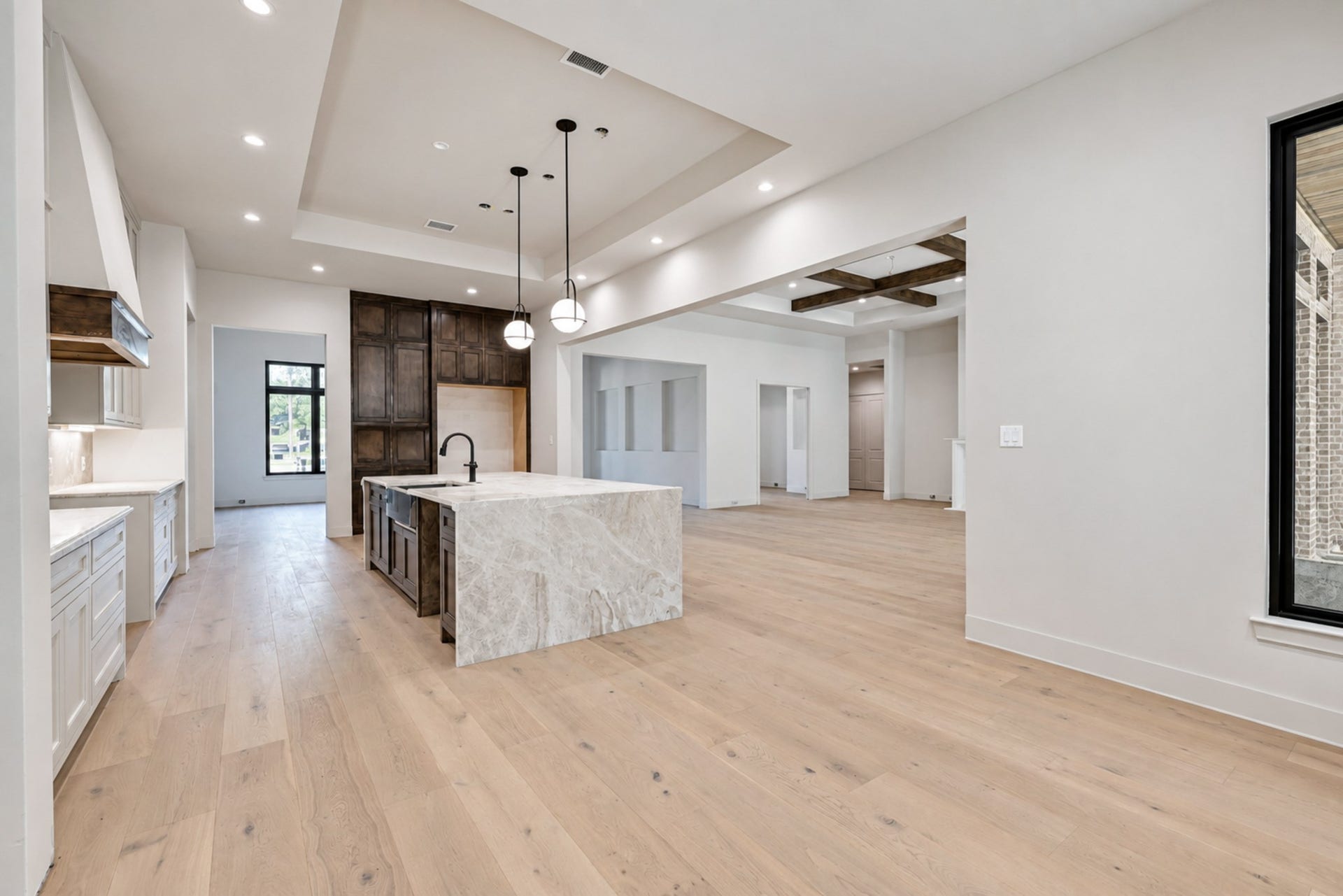 25083 Chisos Bend, Montgomery, TX 77316 View of Kitchen from the breakfast nook that leads to the primary suite