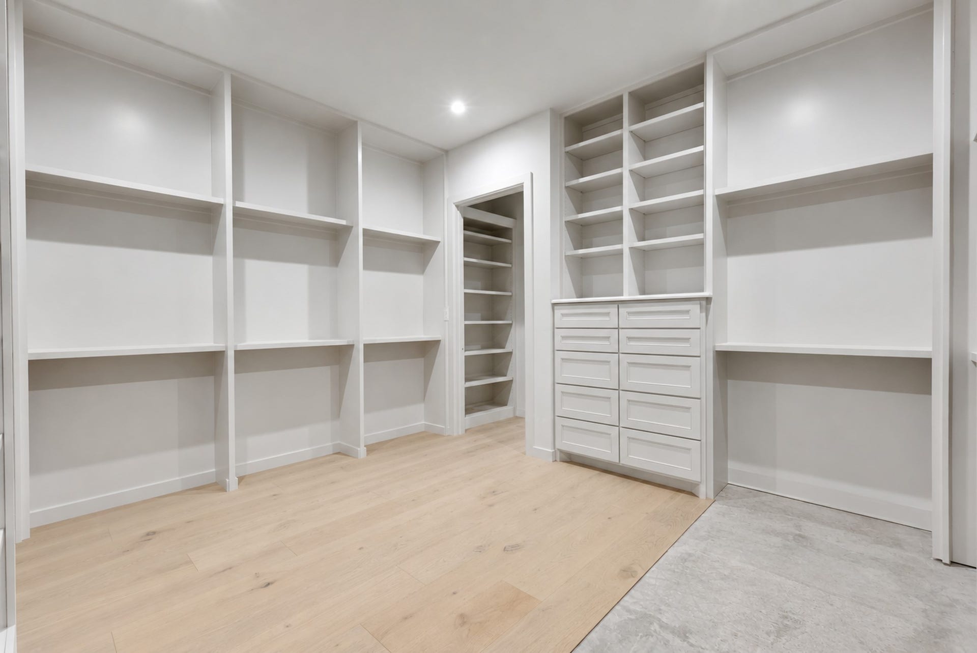 25083 Chisos Bend, Montgomery, TX 77316 Primary closet (still under construction) provides ample space to hang clothes and will feature an island bench in the middle