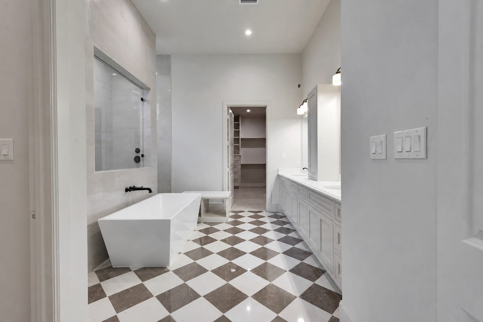 25083 Chisos Bend, Montgomery, TX 77316 Primary restroom with a water closet to the left followed by a soaking tub and standing shower