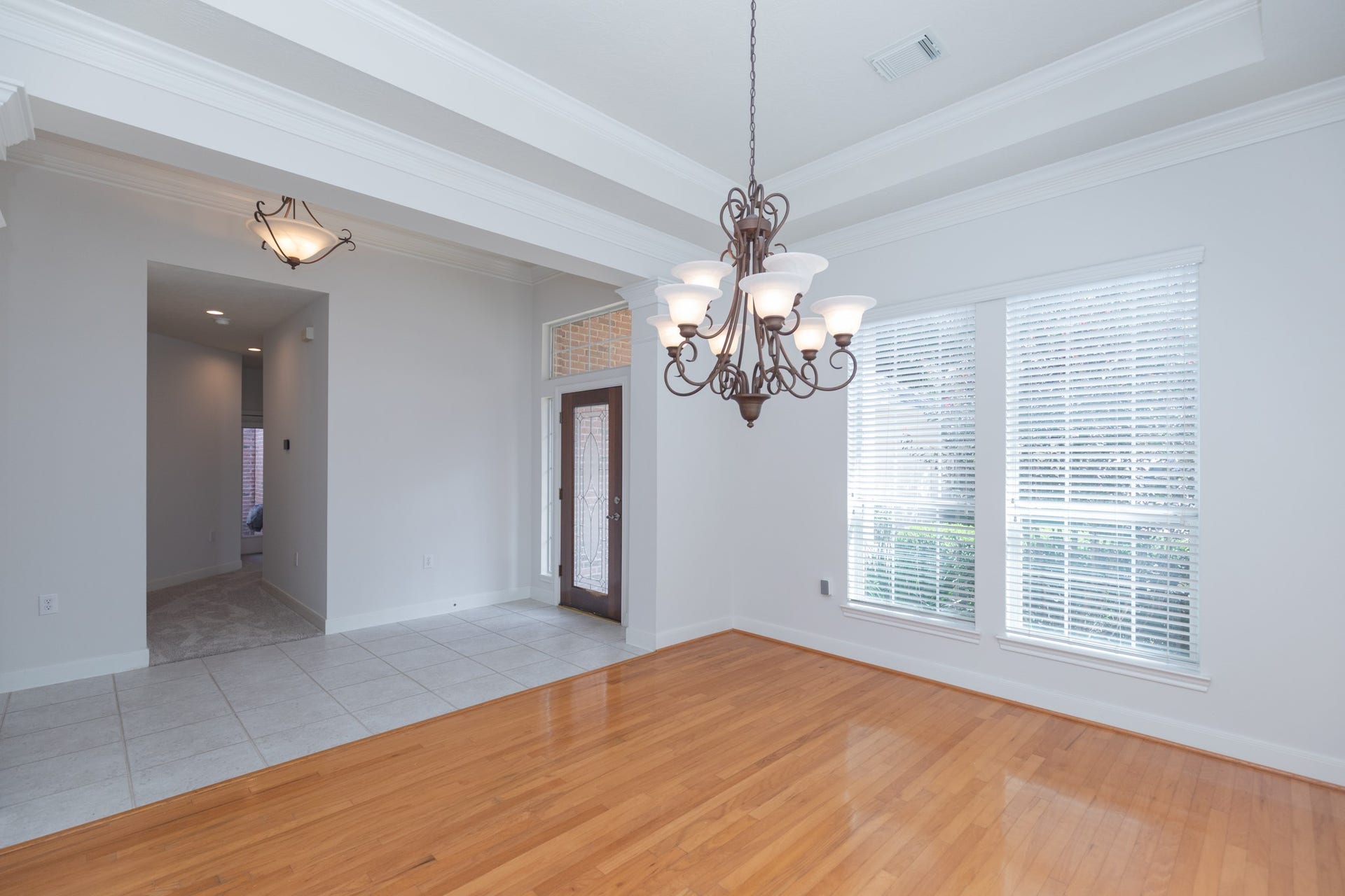 3307 Mcmahon Way, Missouri City, TX 77459 Formal dining room : Wood floor, and Trail high ceiling with crown molding