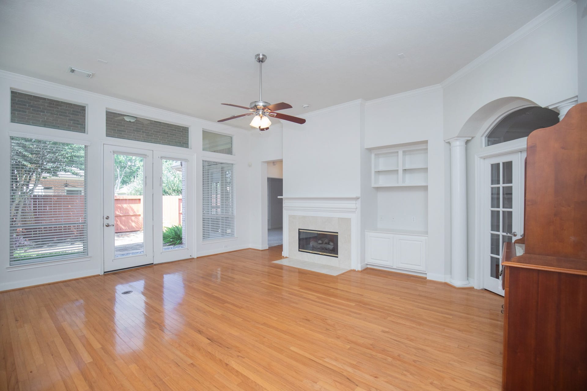 3307 Mcmahon Way, Missouri City, TX 77459 Wood floor in formal dining, entry foryer, and family room