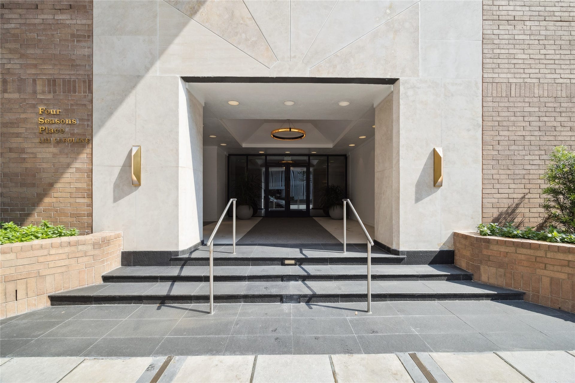 1111 Caroline Street, #2601, Houston, TX 77010 Separate residential entry provides a dedicated arrival point apart from the hotel entrance. Covered approach leads from the street into the residential lobby.