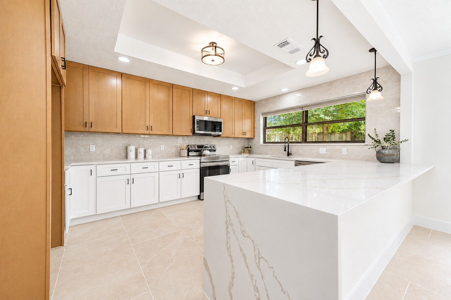 109 Dorado Drive, Friendswood, TX 77546 Alternative kitchen view showcasing the island and cabinetry.