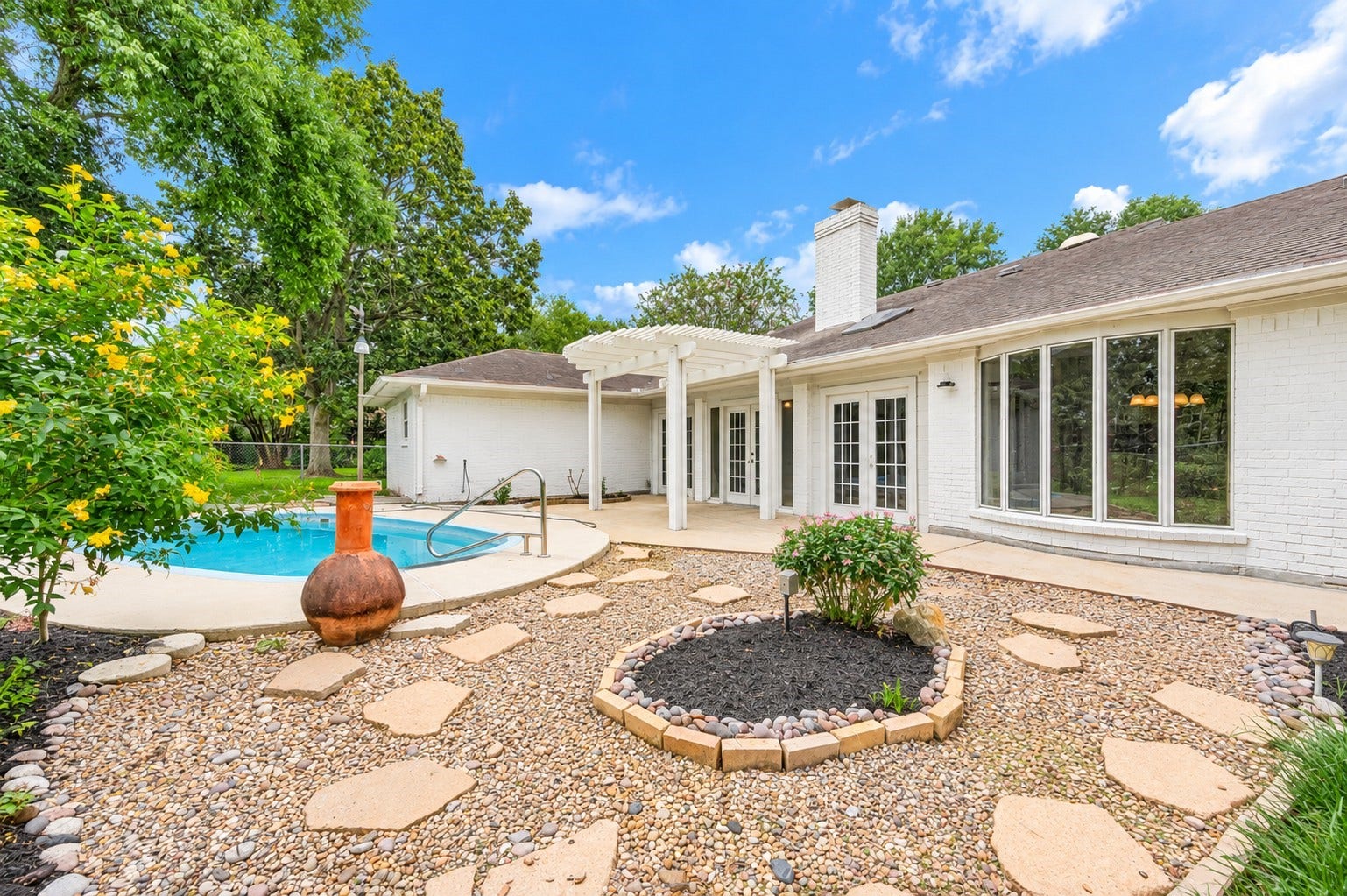 109 Dorado Drive, Friendswood, TX 77546 Alternative view of the backyard and outdoor living space.