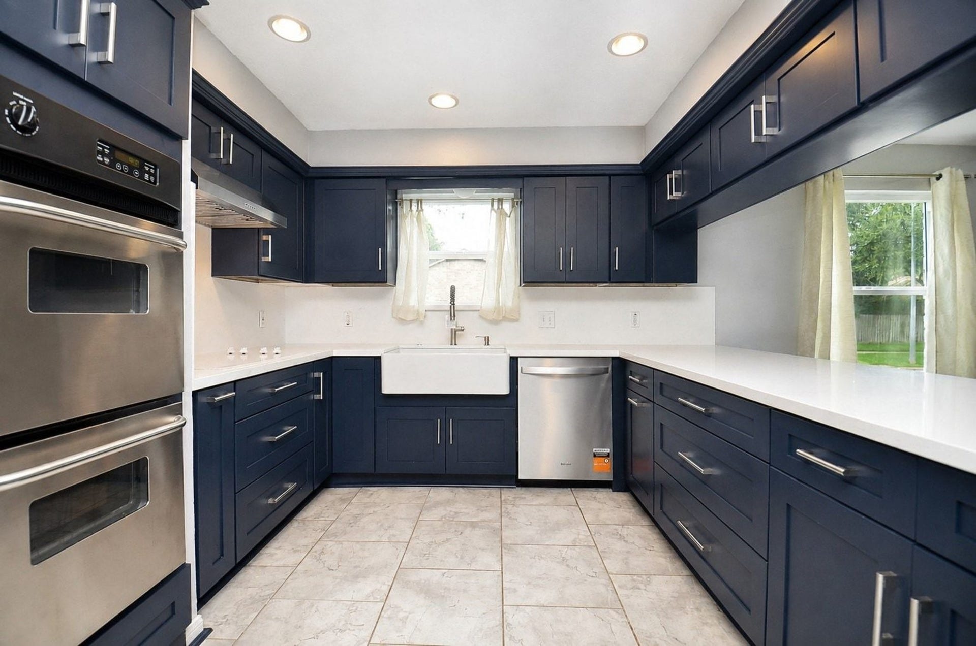 Brand New Chic White Quartz Counter Top/ Ocean Blue Shaker Soft-Close Cabinets.