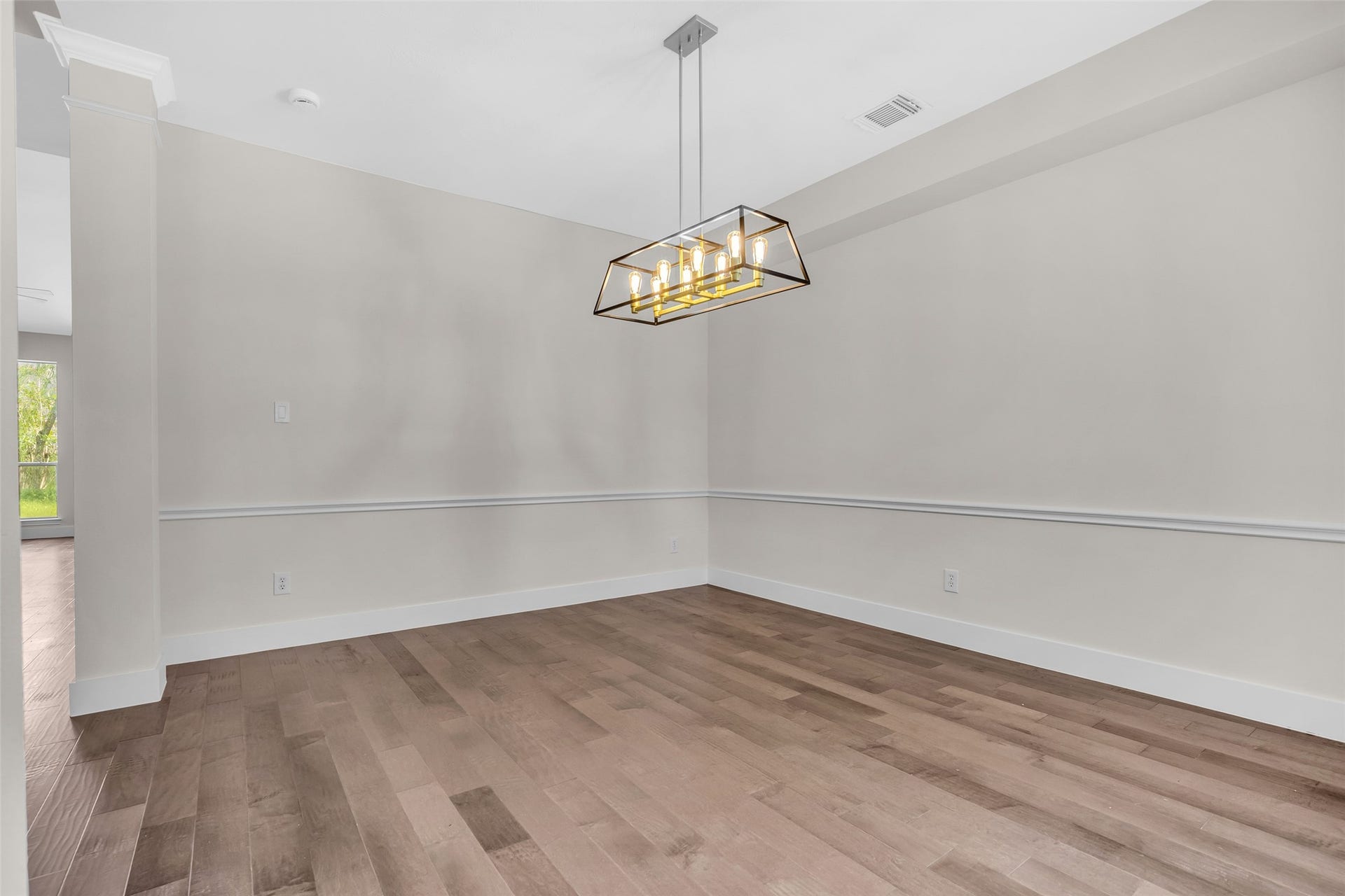 22002 Madera Canyon Court, Richmond, TX 77469 dining room highlighted by a beautiful black light fixture for that perfect touch!