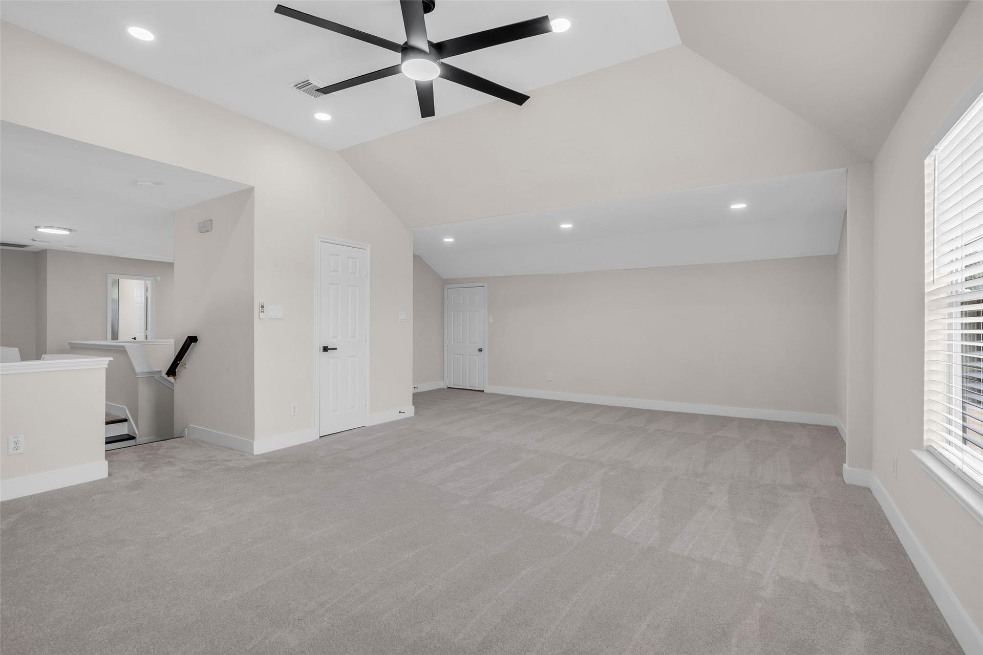 22002 Madera Canyon Court, Richmond, TX 77469 Expansive game room perfect for entertainment and relaxation, boasting ample space and modern finishes.