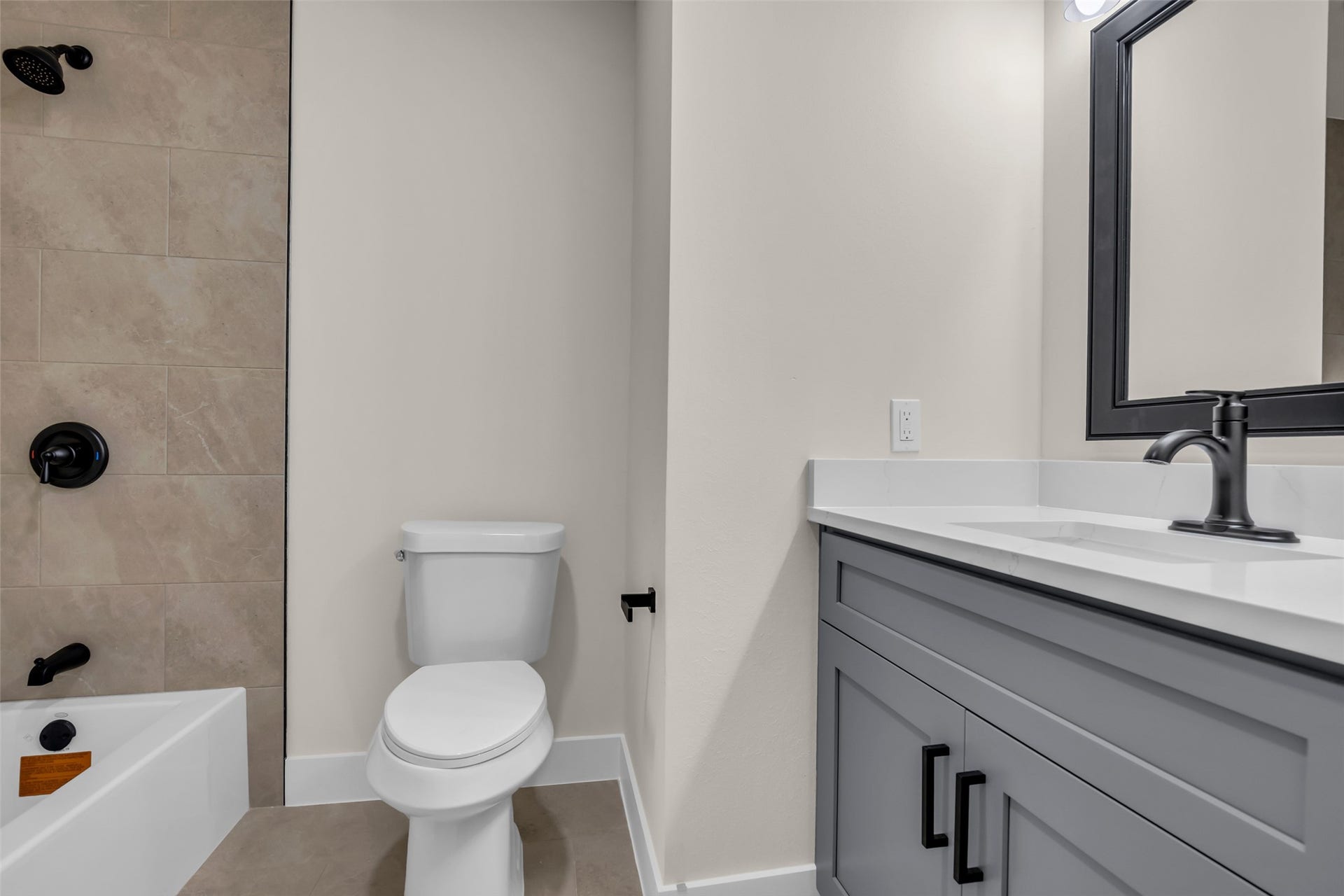 22002 Madera Canyon Court, Richmond, TX 77469 Fully remodeled secondary bath with matte black lighting fixtures and faucets and new vanities with quartz countertops
