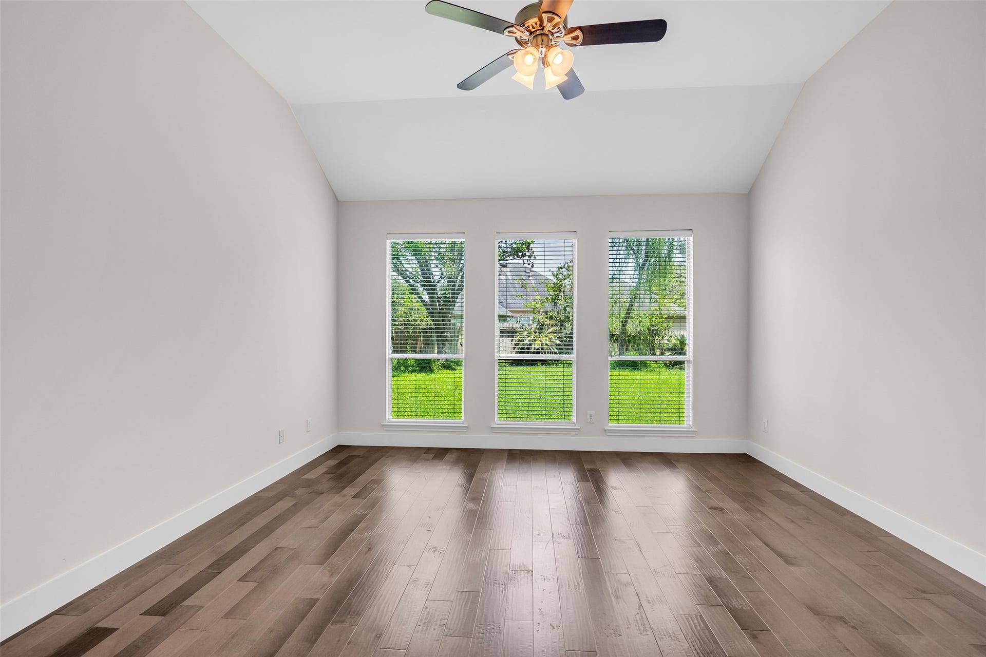 22002 Madera Canyon Court, Richmond, TX 77469 primary bedroom with huge windows to let in the light!
