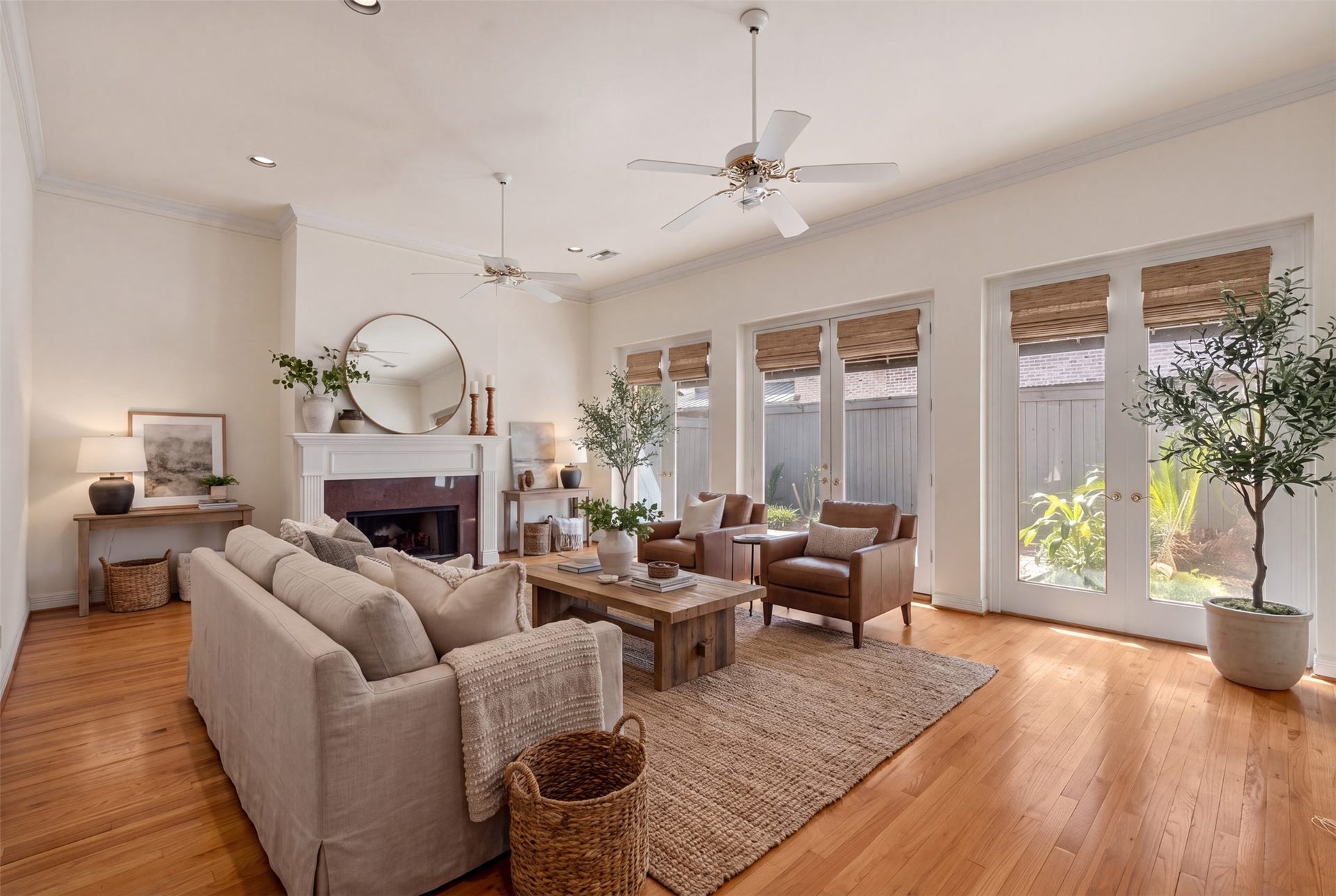 3923 Childress Street, #A, Houston, TX 77005 This spacious living area features an expansive open-concept layout, perfect for both comfortable daily living and large-scale entertaining. With abundant natural light. AI photo suggesting furnishings.