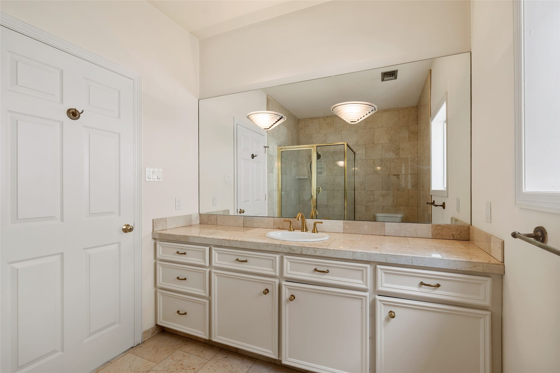 3923 Childress Street, #A, Houston, TX 77005 2nd primary bathroom featuring a spacious vanity with ample storage, a large mirror, and a luxurious glass-enclosed shower.