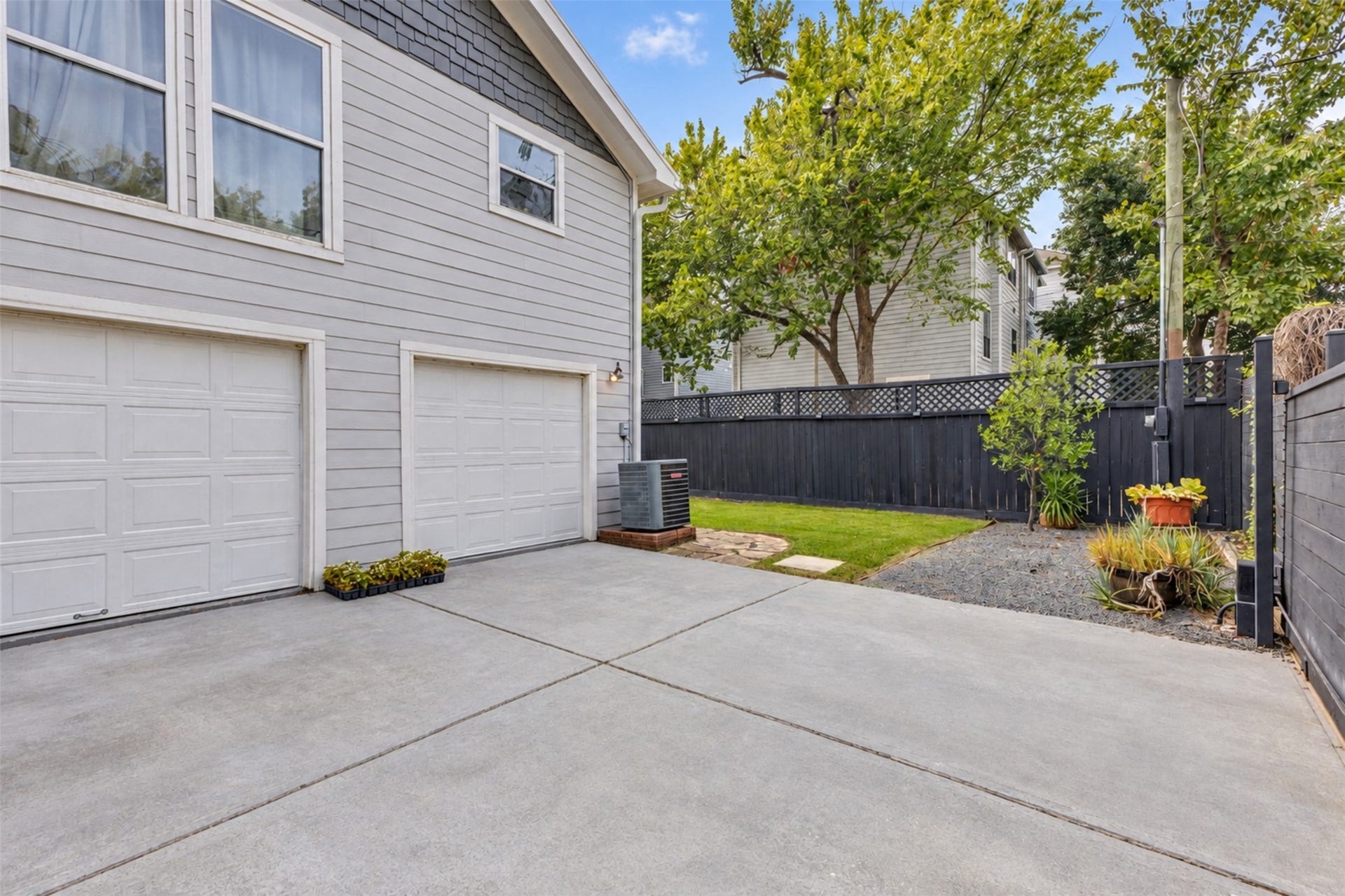 827 W 19th Street and 829 W 19th Street, Houston, TX 77008 Two car garage and view toward 829 W. 19th Street