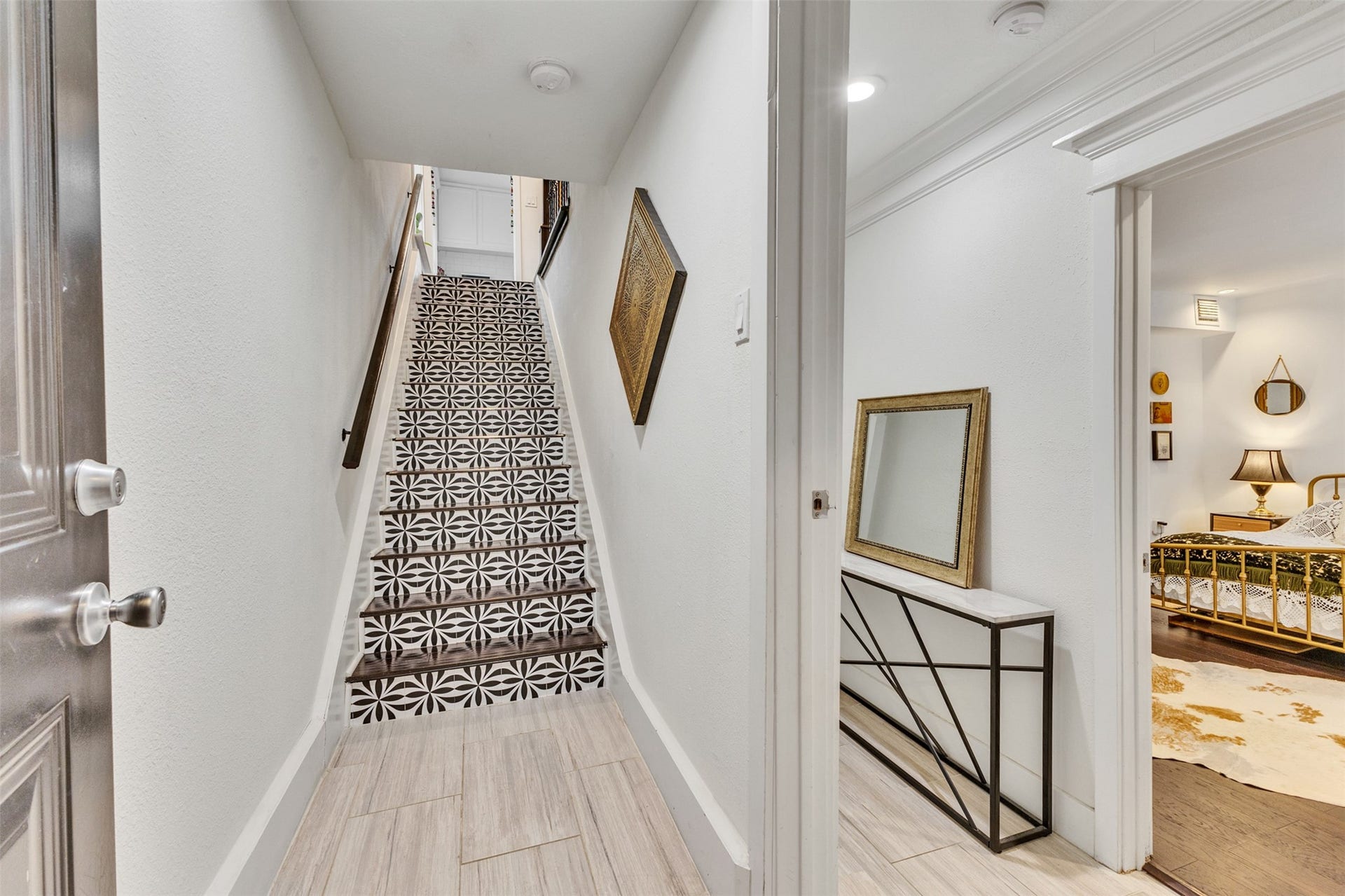 827 W 19th Street and 829 W 19th Street, Houston, TX 77008 Stairs to 2nd floor with view of primary bedroom
