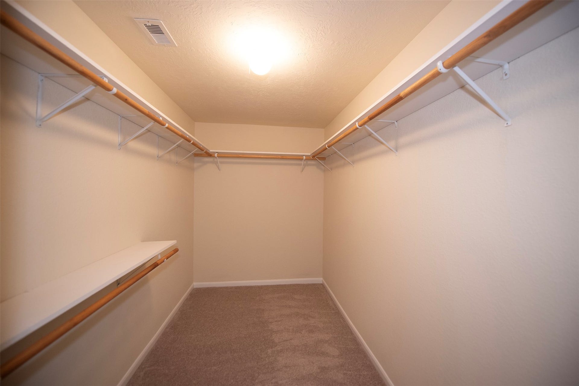 106 Easton Glen Lane, Dickinson, TX 77539 Huge walk in closet in master. Plenty of space for sharing.
